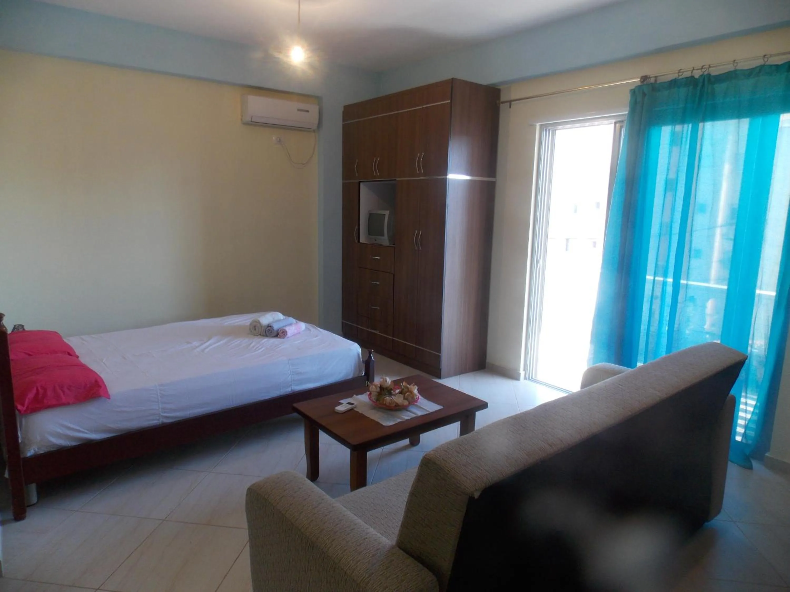 Bed in Angela Apartments