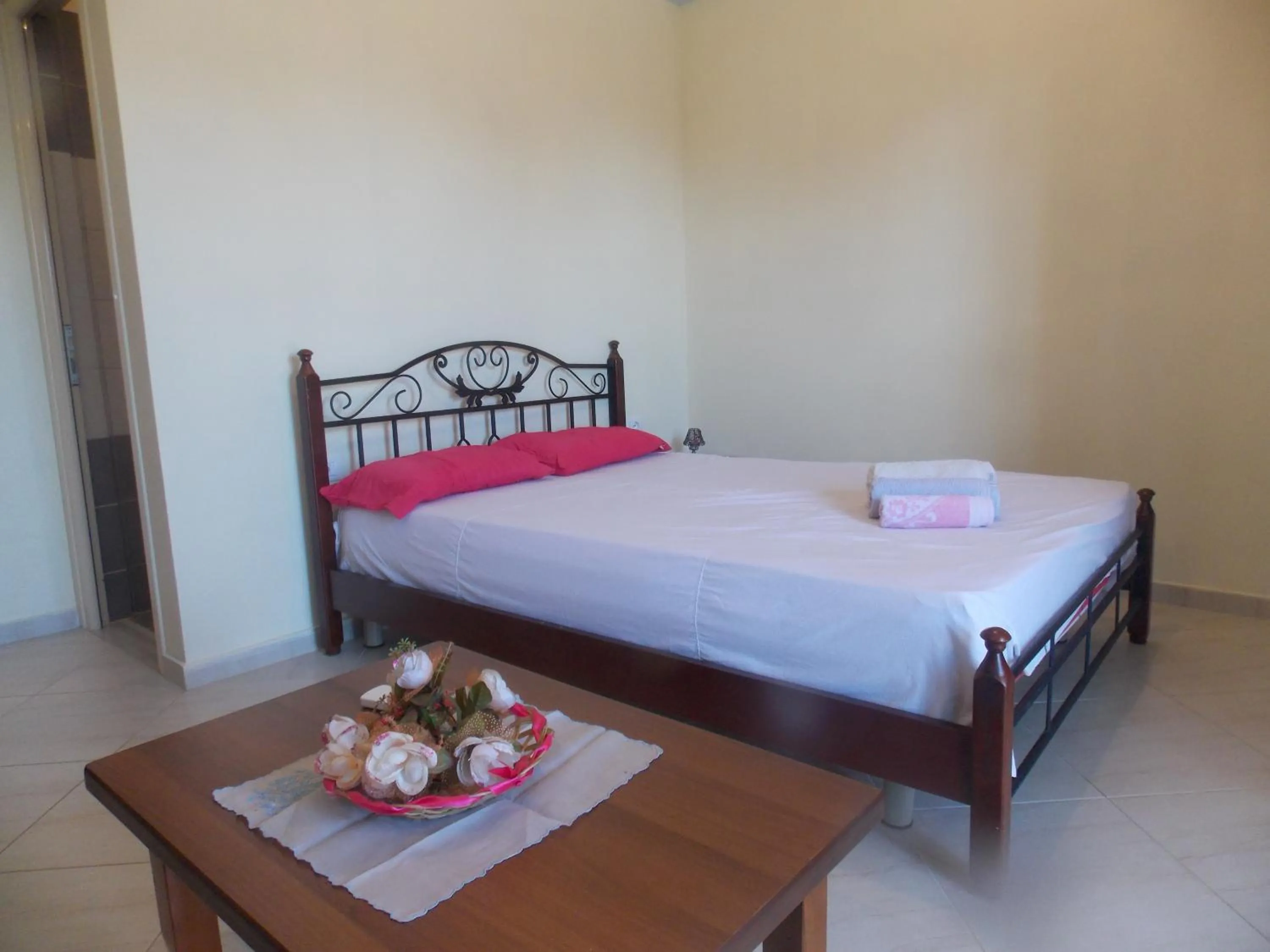 Bed in Angela Apartments
