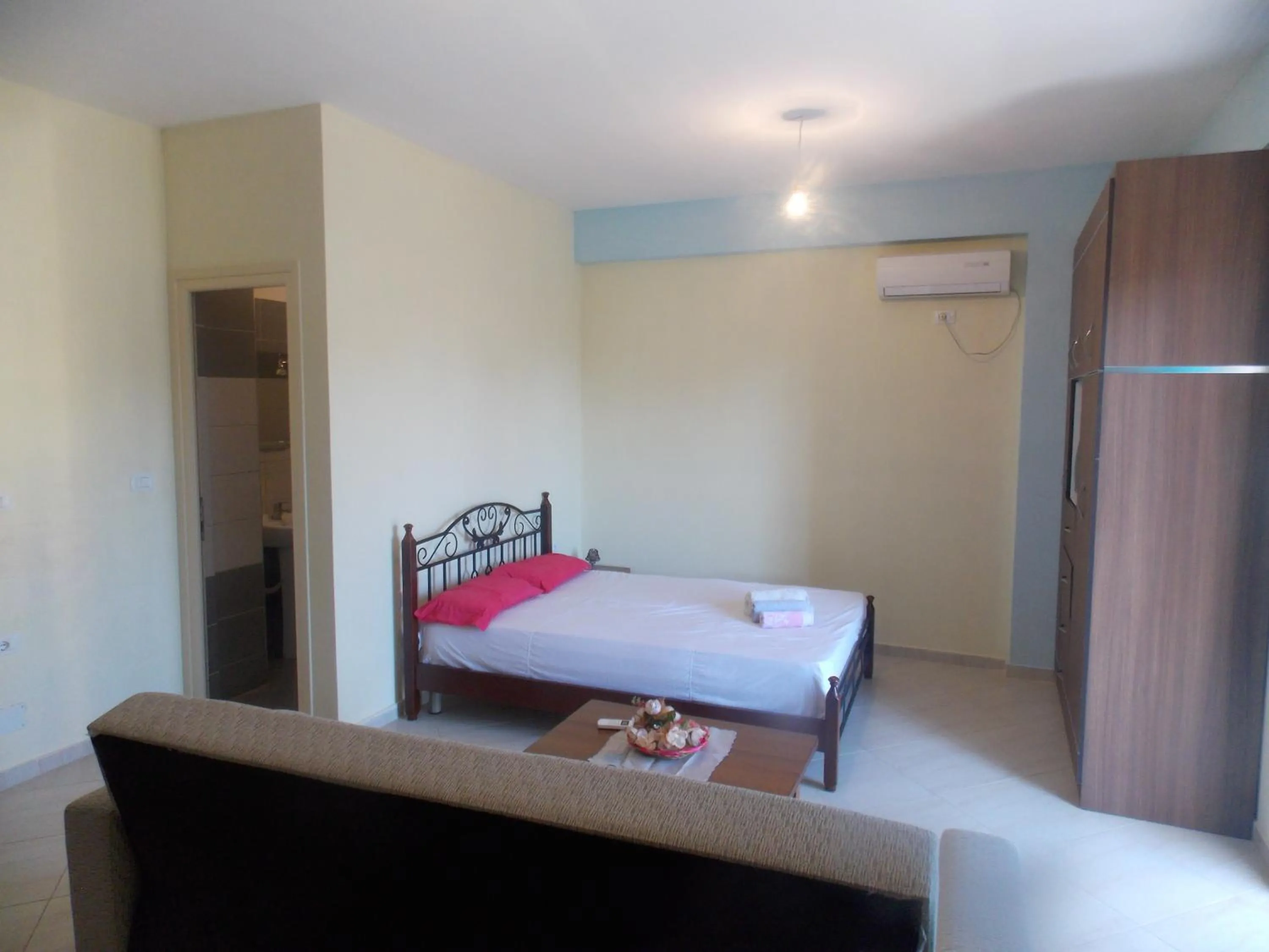 Bed in Angela Apartments