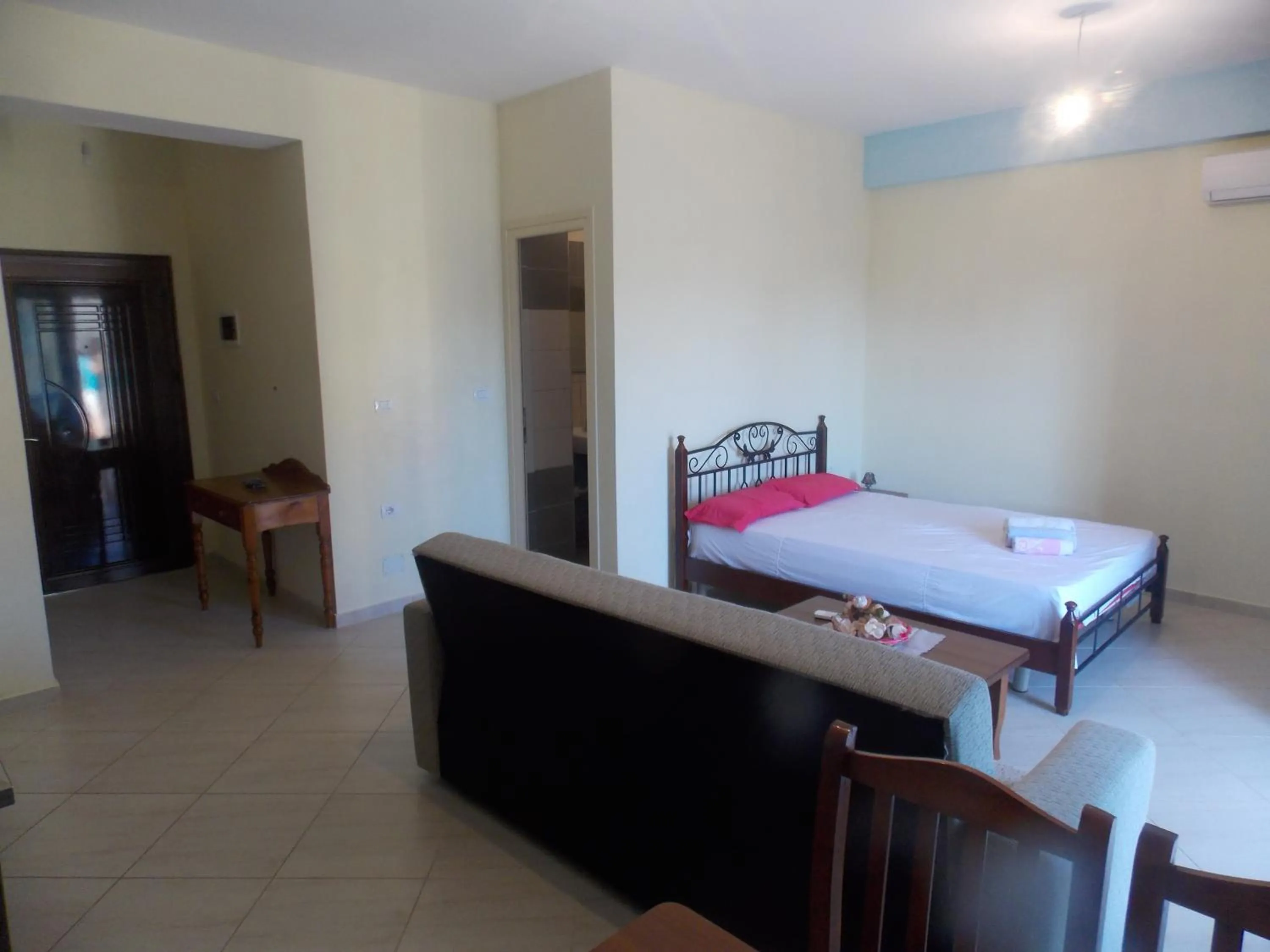 Bed in Angela Apartments