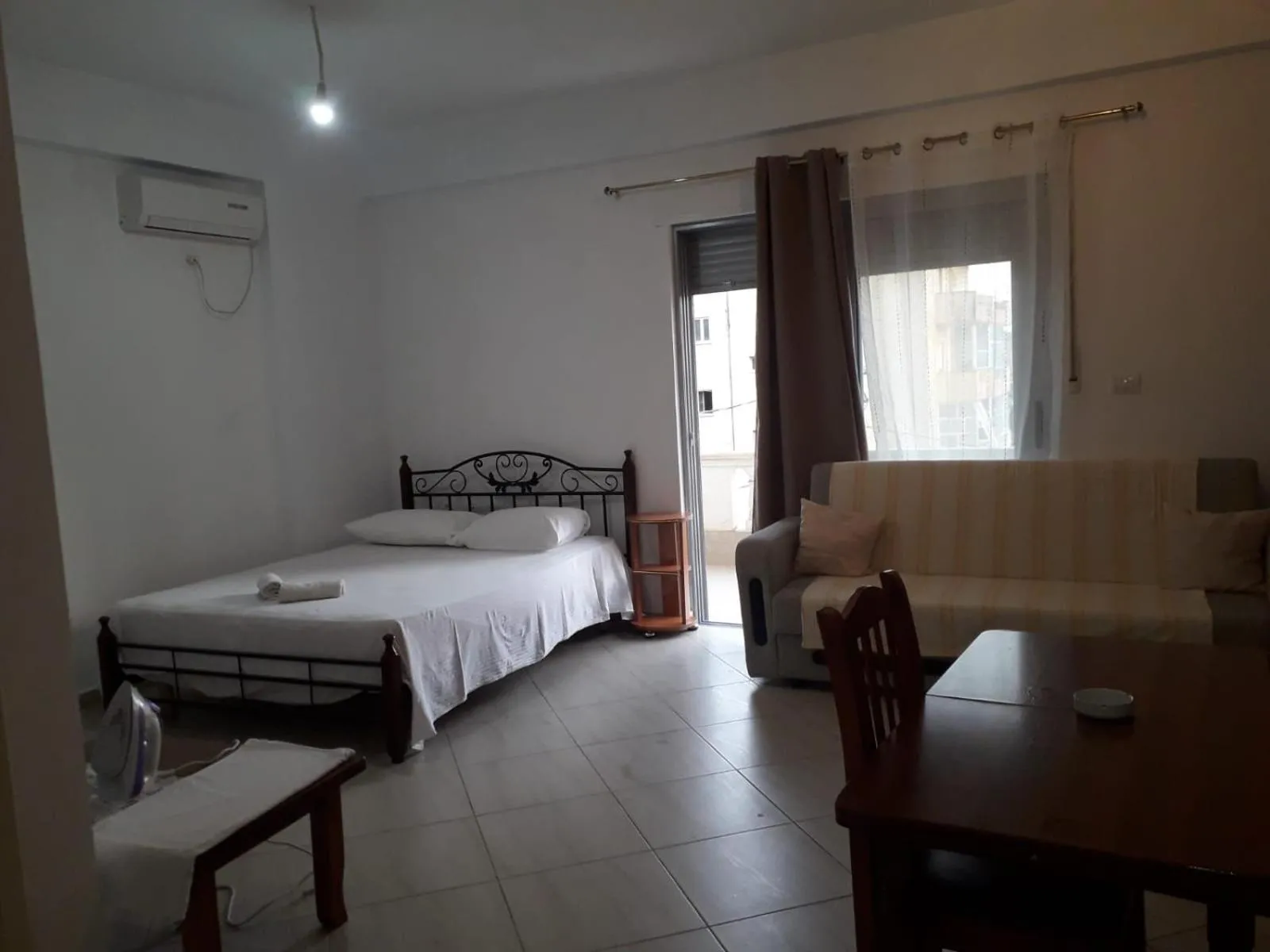Bed in Angela Apartments