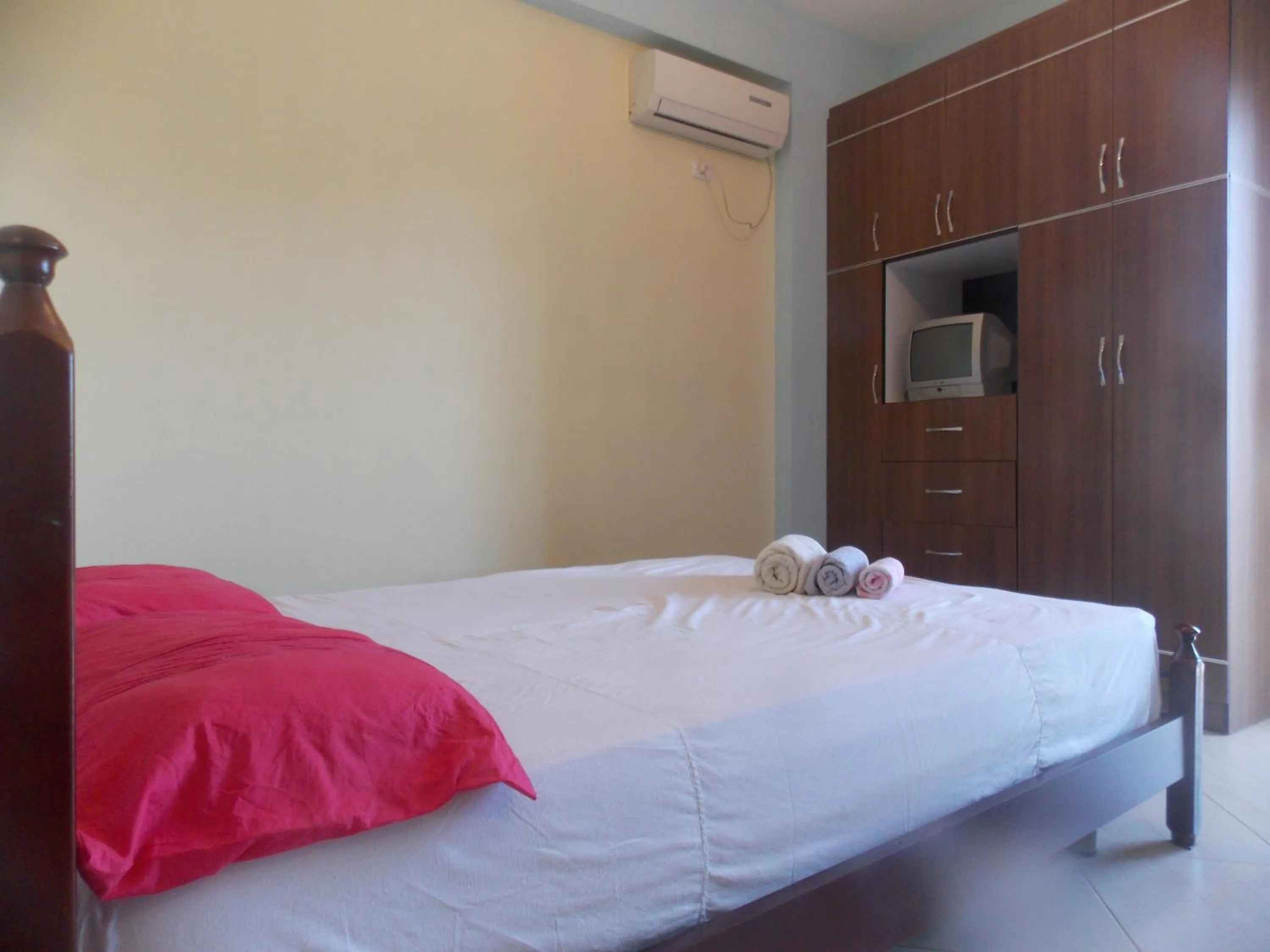 Bed in Angela Apartments