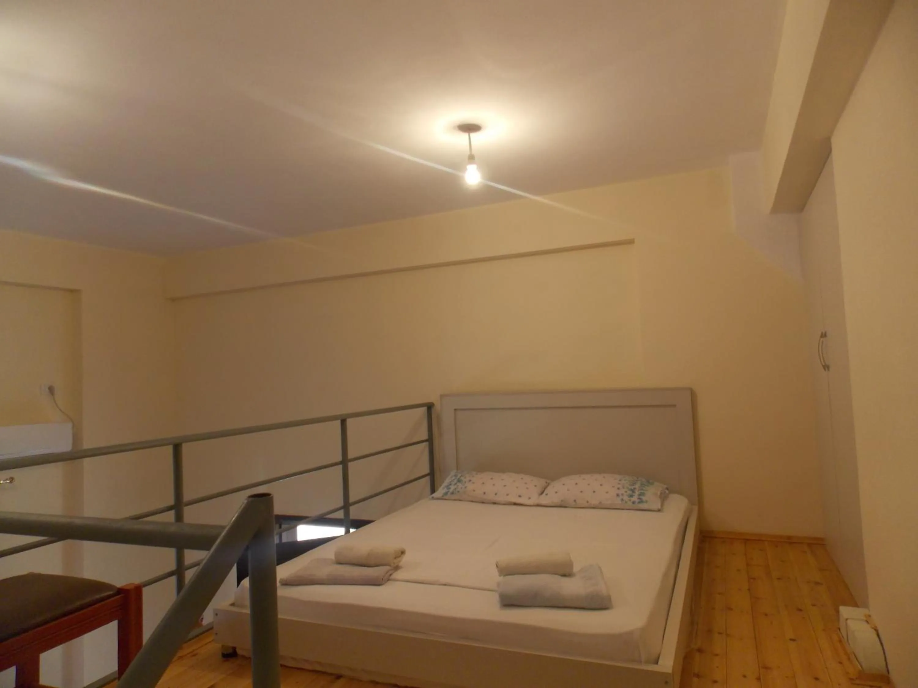 Bed in Angela Apartments