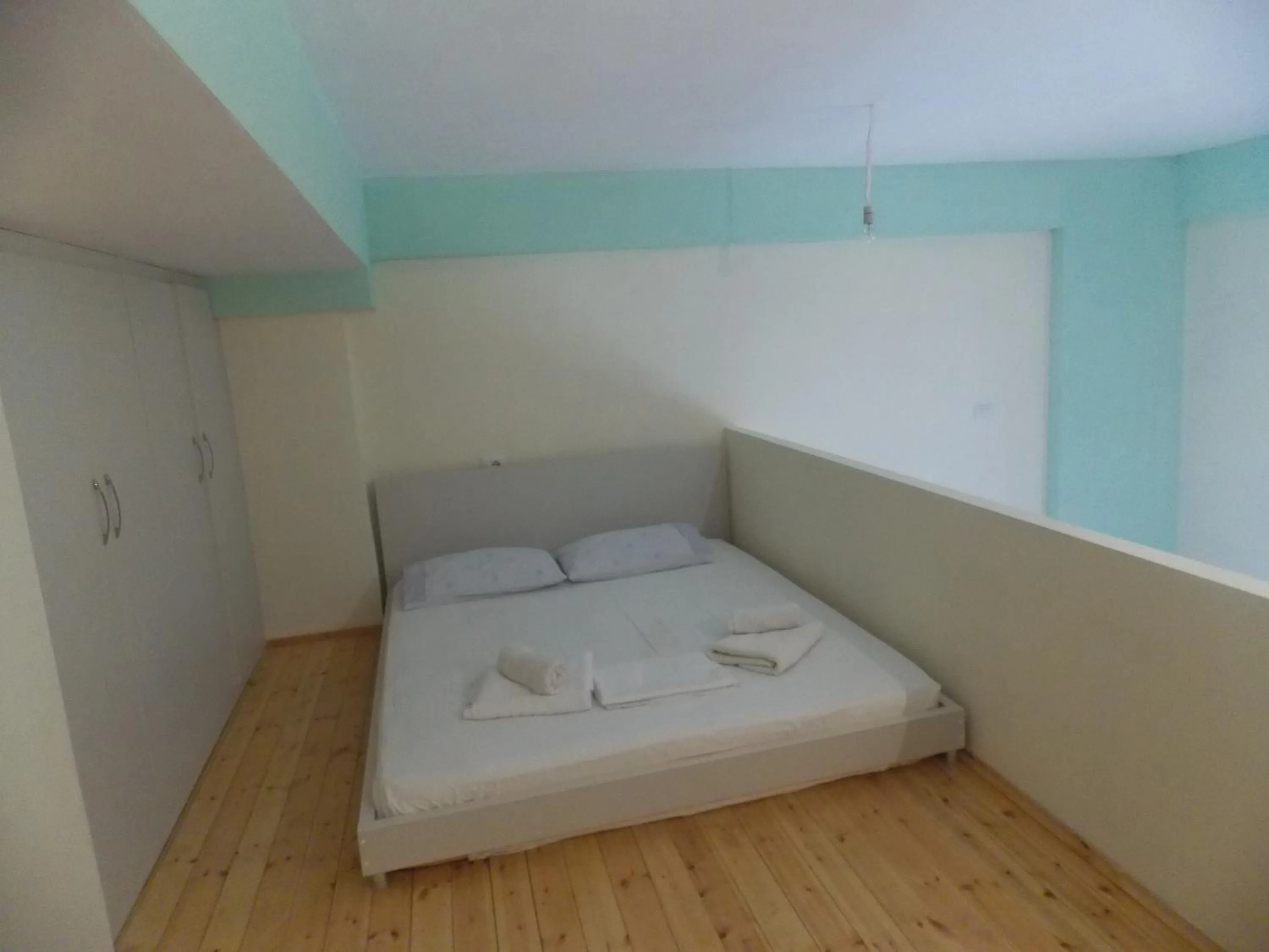 Bed in Angela Apartments