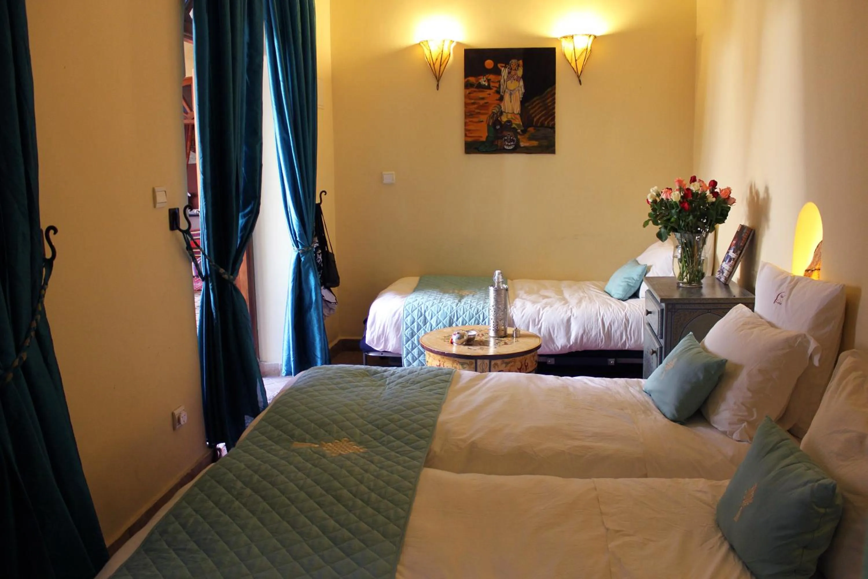 Bed in Riad Léna & Spa