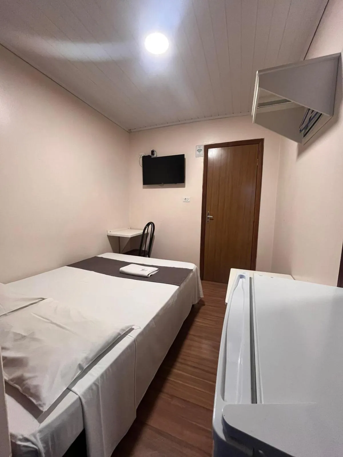 Bed in Queiroz Palace Hotel