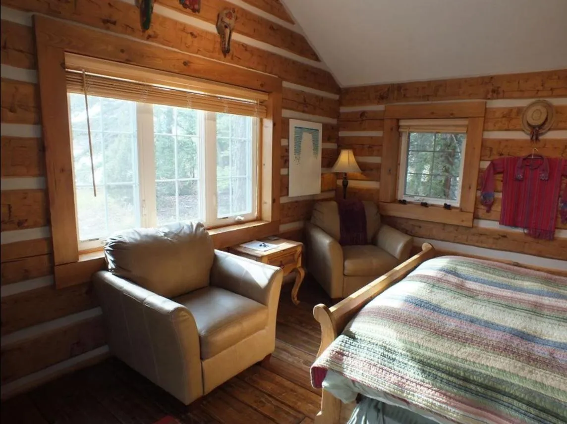 Bed in Riverside Meadows Cabins