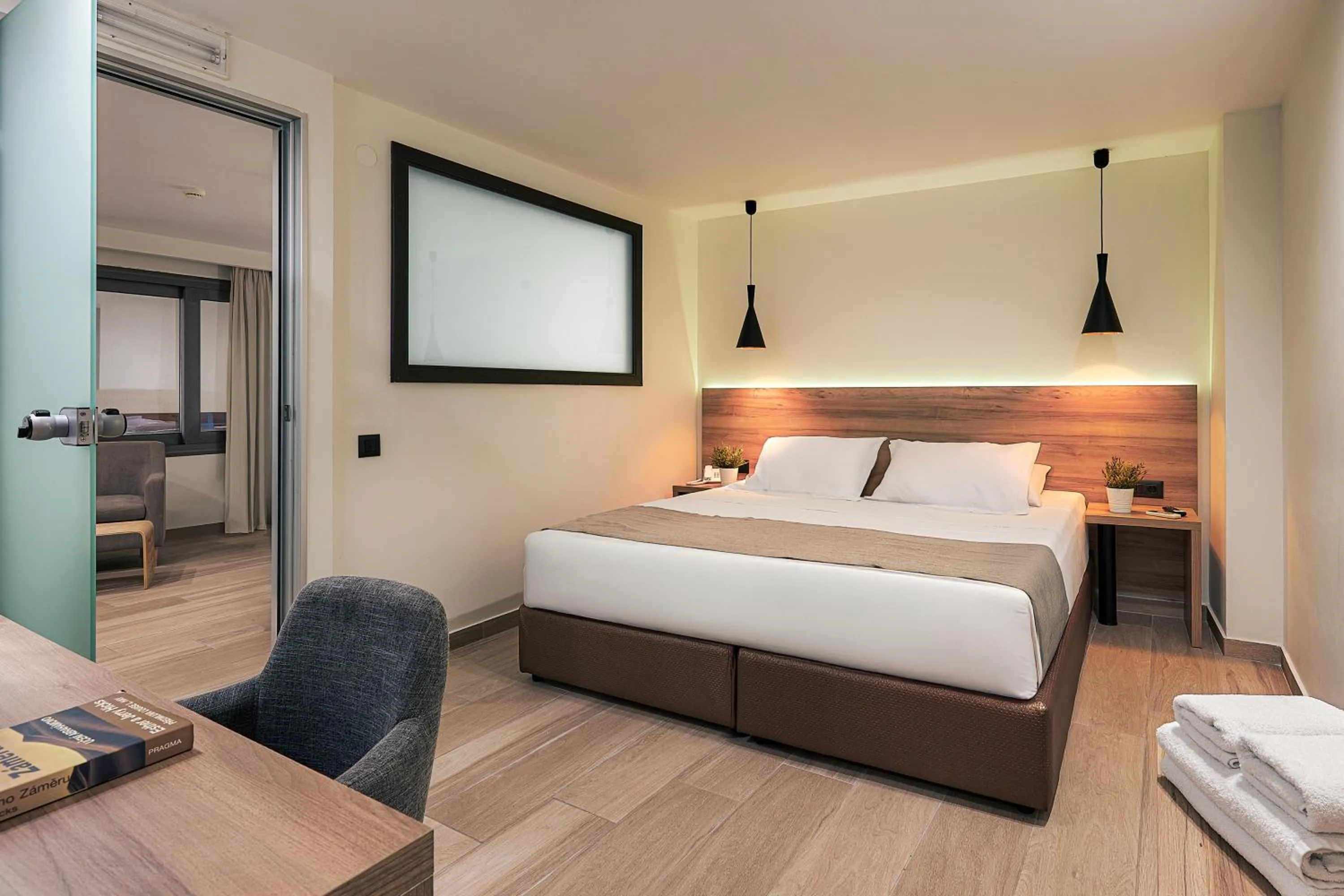 Bed in Dionisos Hotel