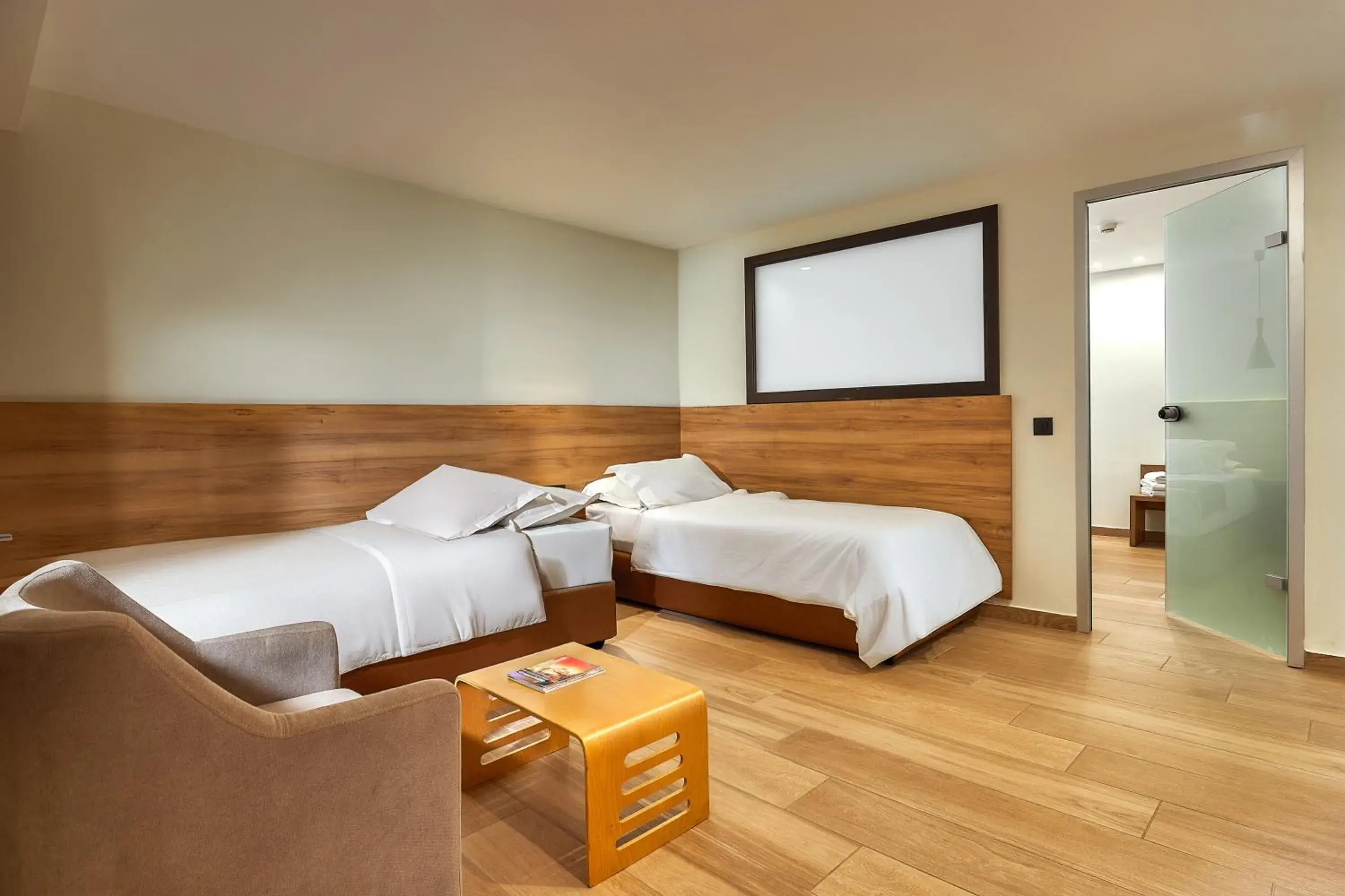 Bed in Dionisos Hotel Bed in Dionisos Hotel