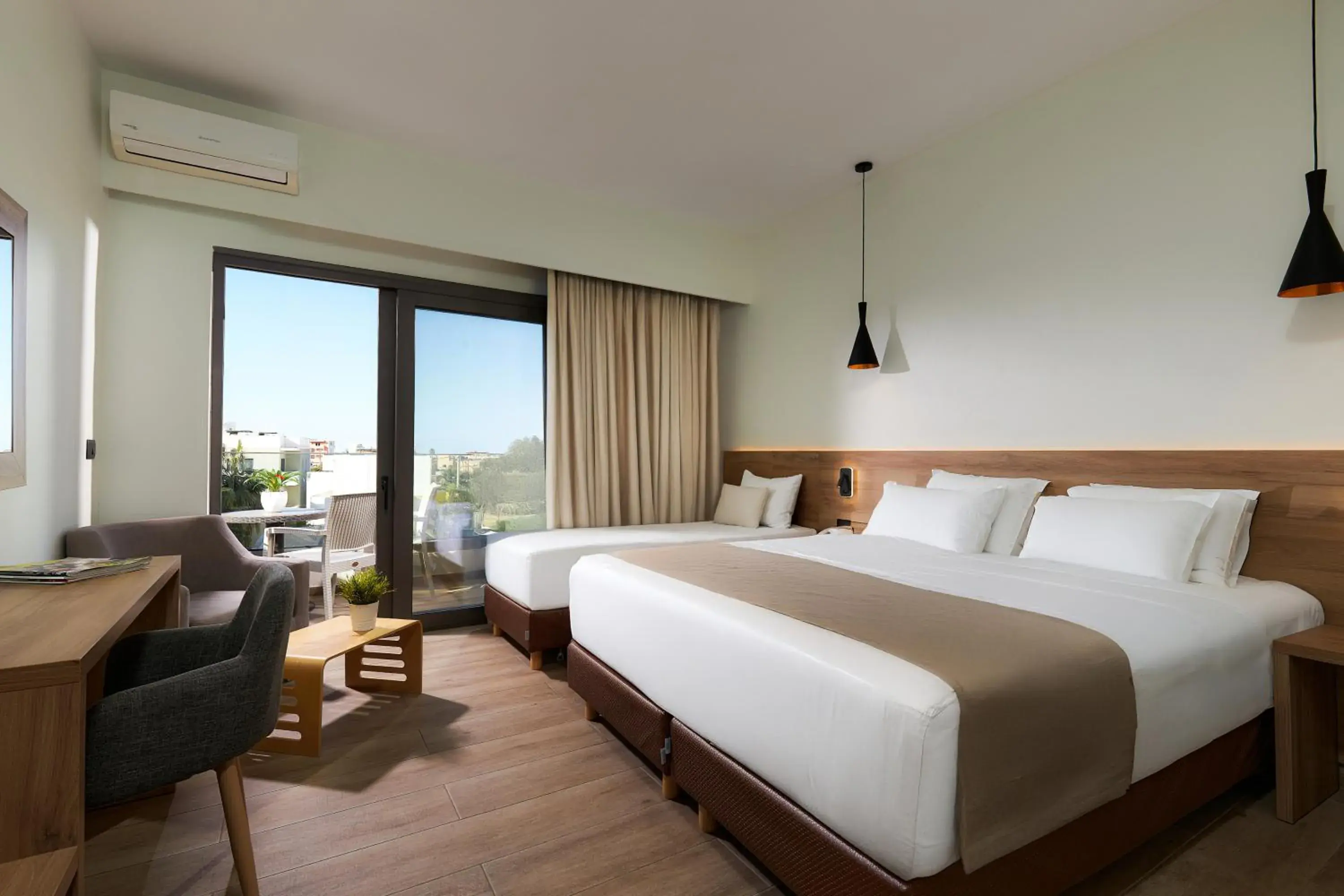 Triple Room in Dionisos Hotel Triple Room in Dionisos Hotel