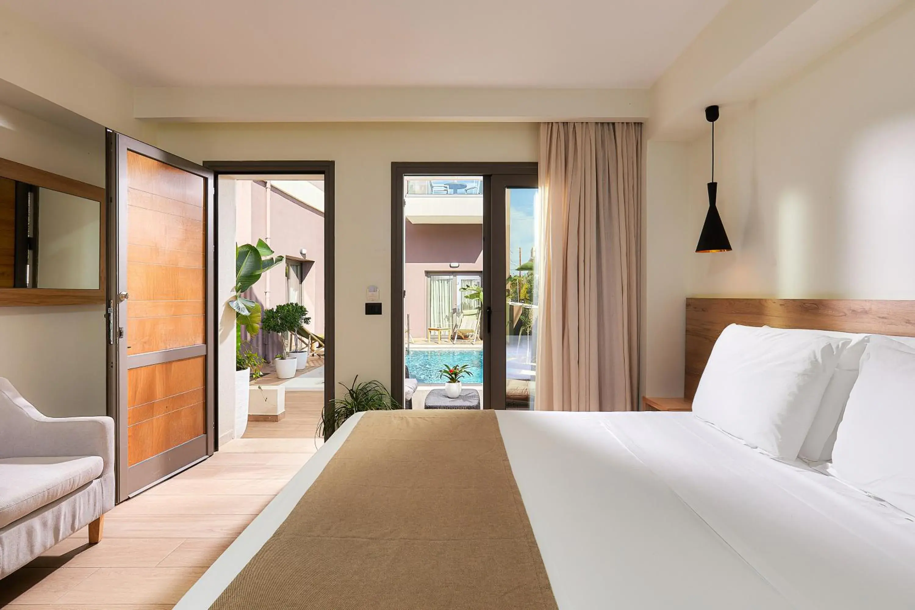 Bed in Dionisos Hotel Bed in Dionisos Hotel