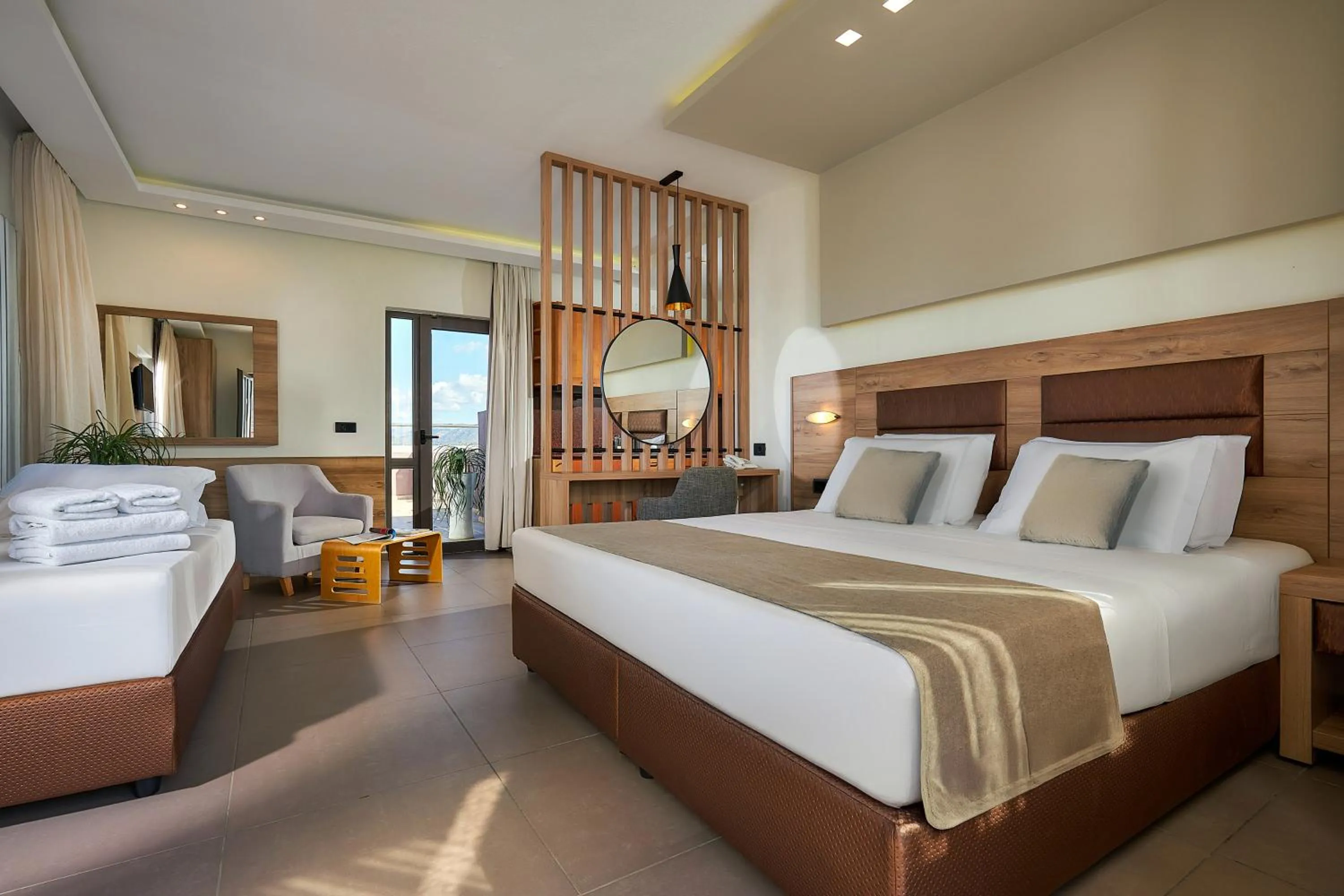 Bed in Dionisos Hotel