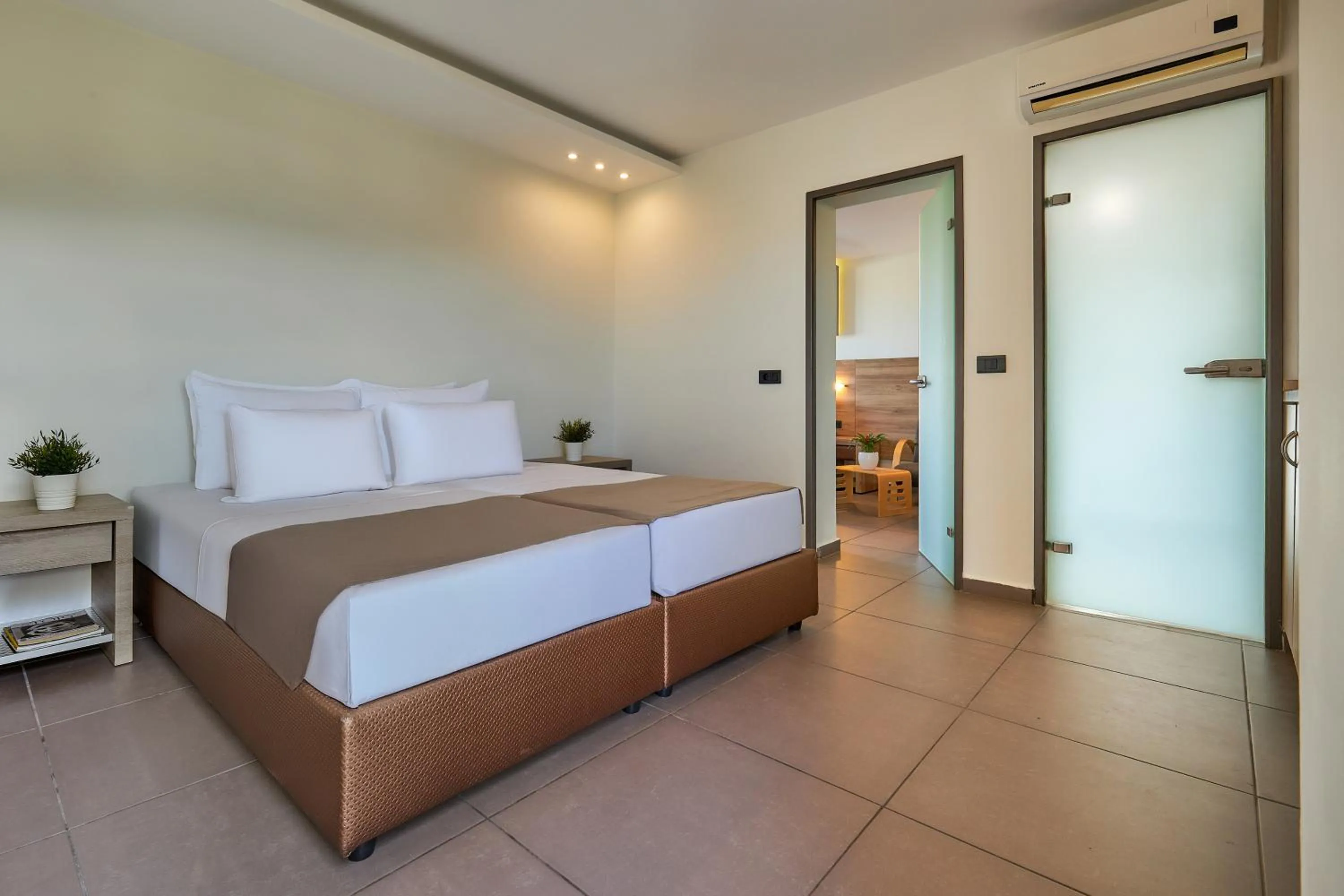 Bed in Dionisos Hotel