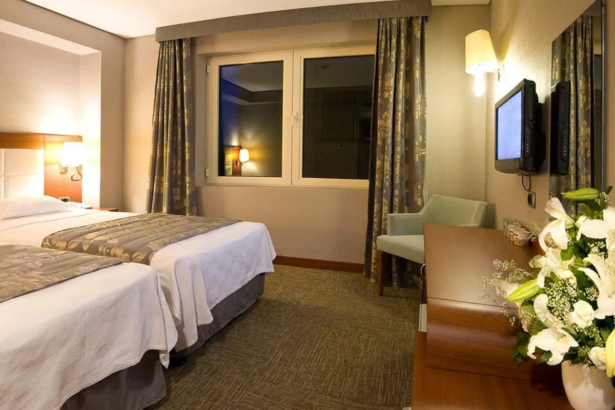 Living room, Bed in Innpera Hotel