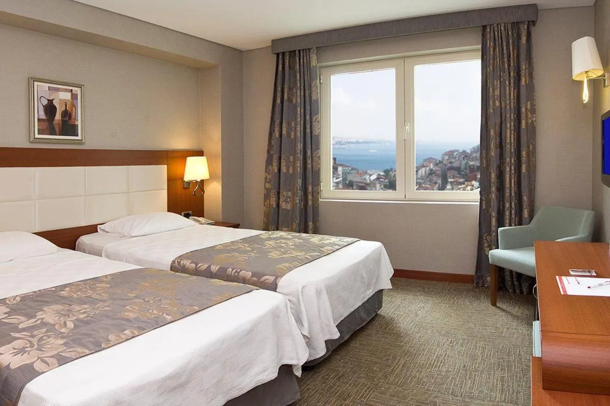 Bed in Innpera Hotel