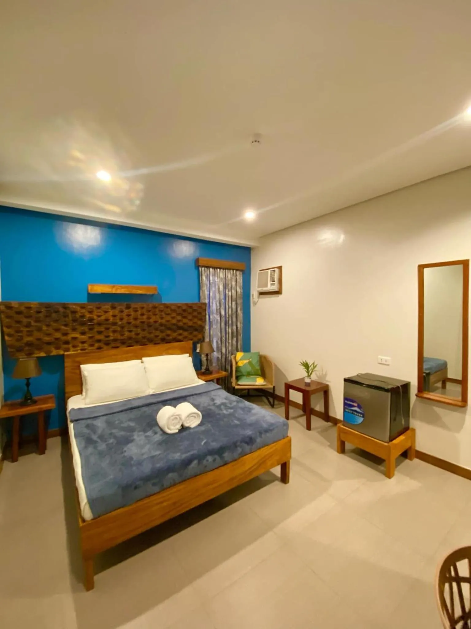 Bed in Acacia Garden Inn and Suites