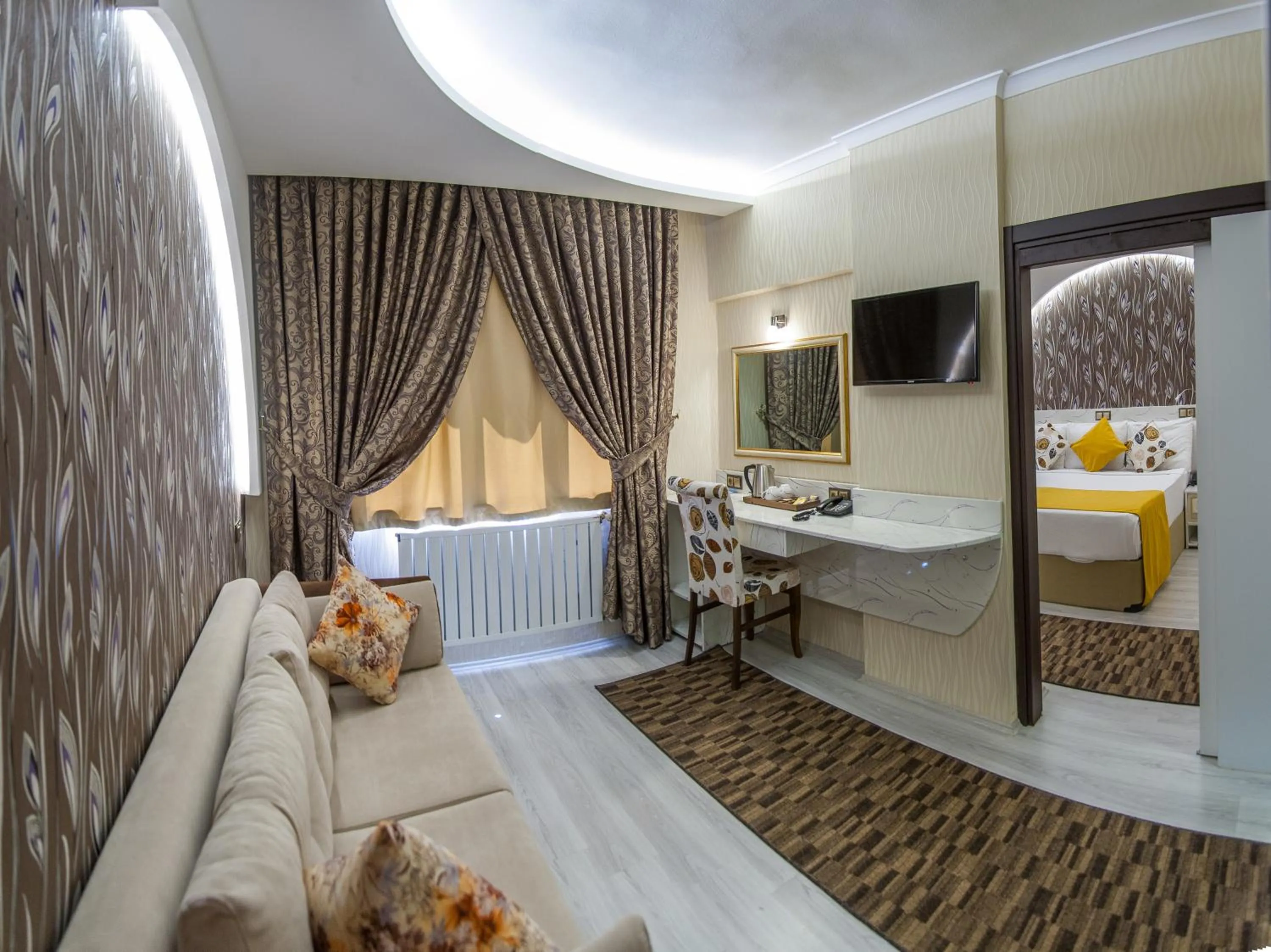 Seating area, Bed in Dündar Hotel