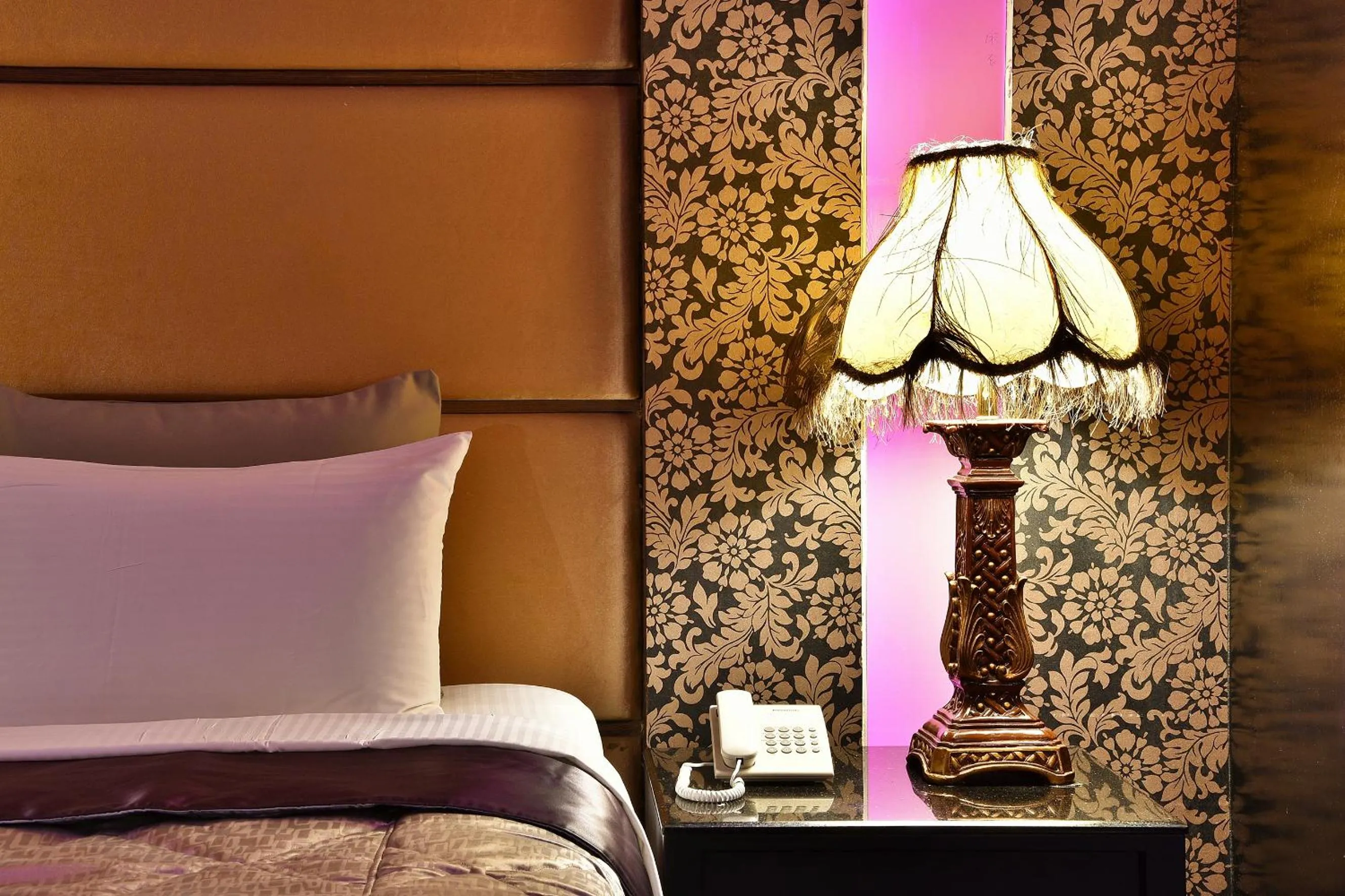 Decorative detail, Bed in Vogue Boutique Motel