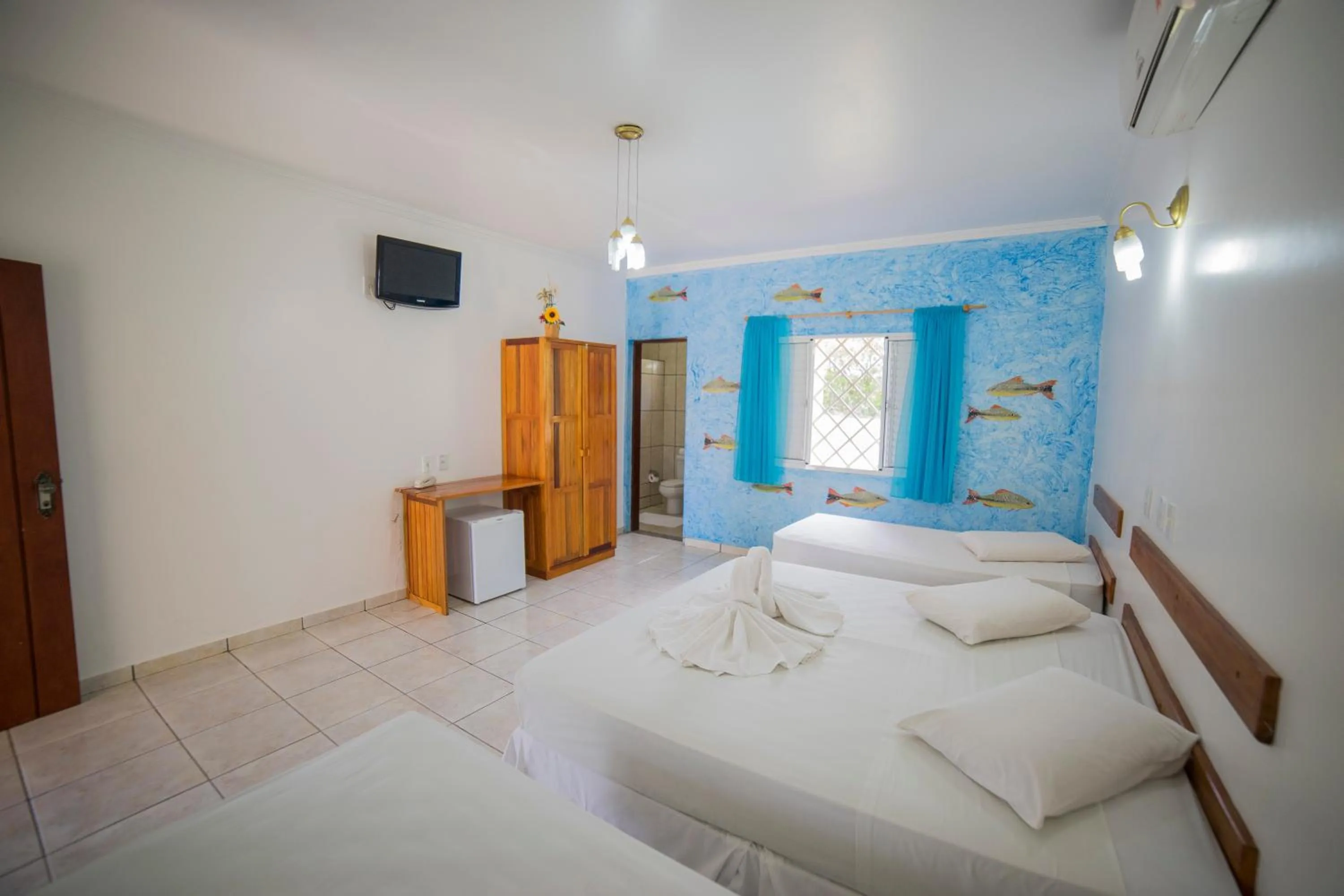 Photo of the whole room, Bed in Hotel Pousada Arauna