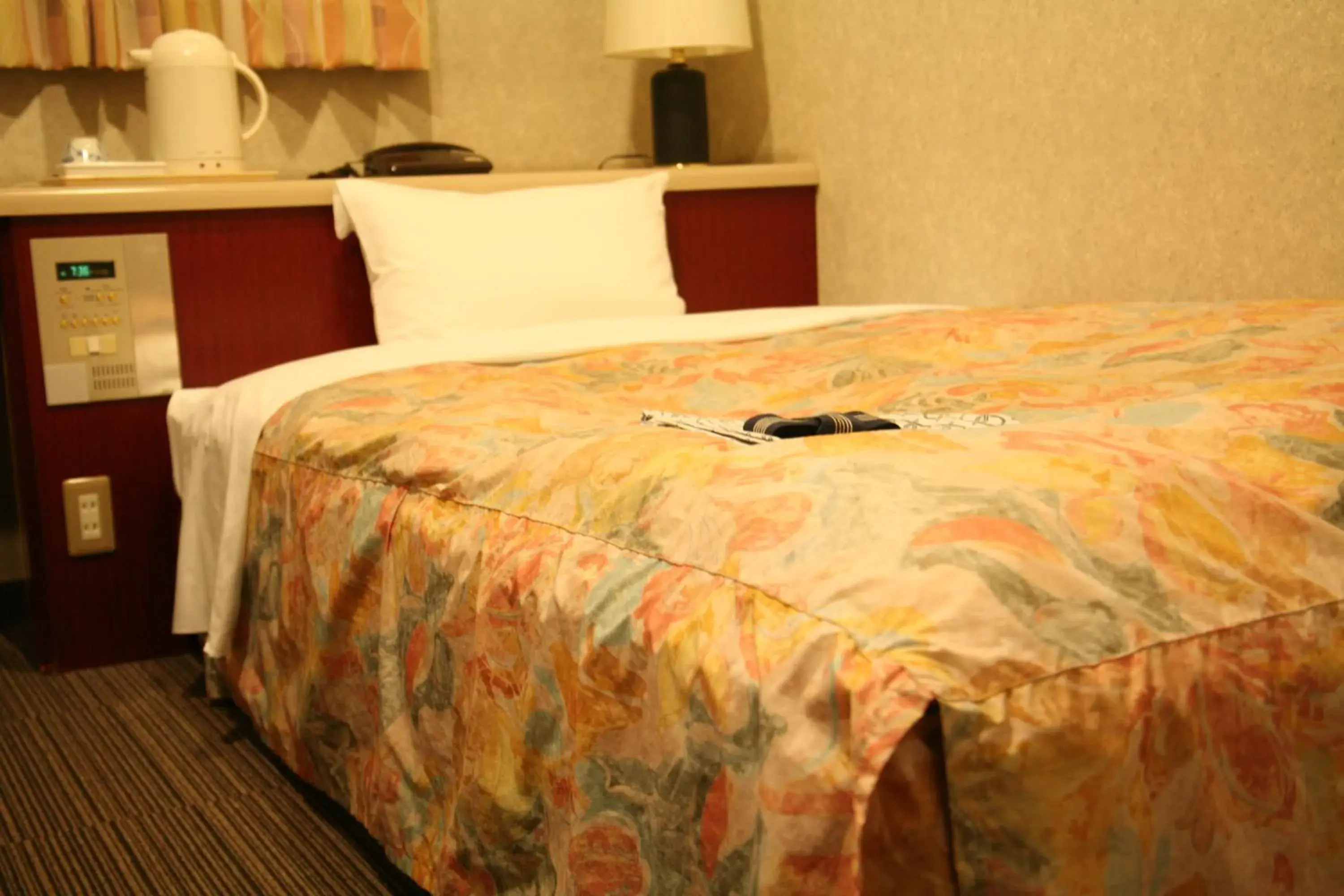 Bed in Hotel Ikeda Bed in Hotel Ikeda