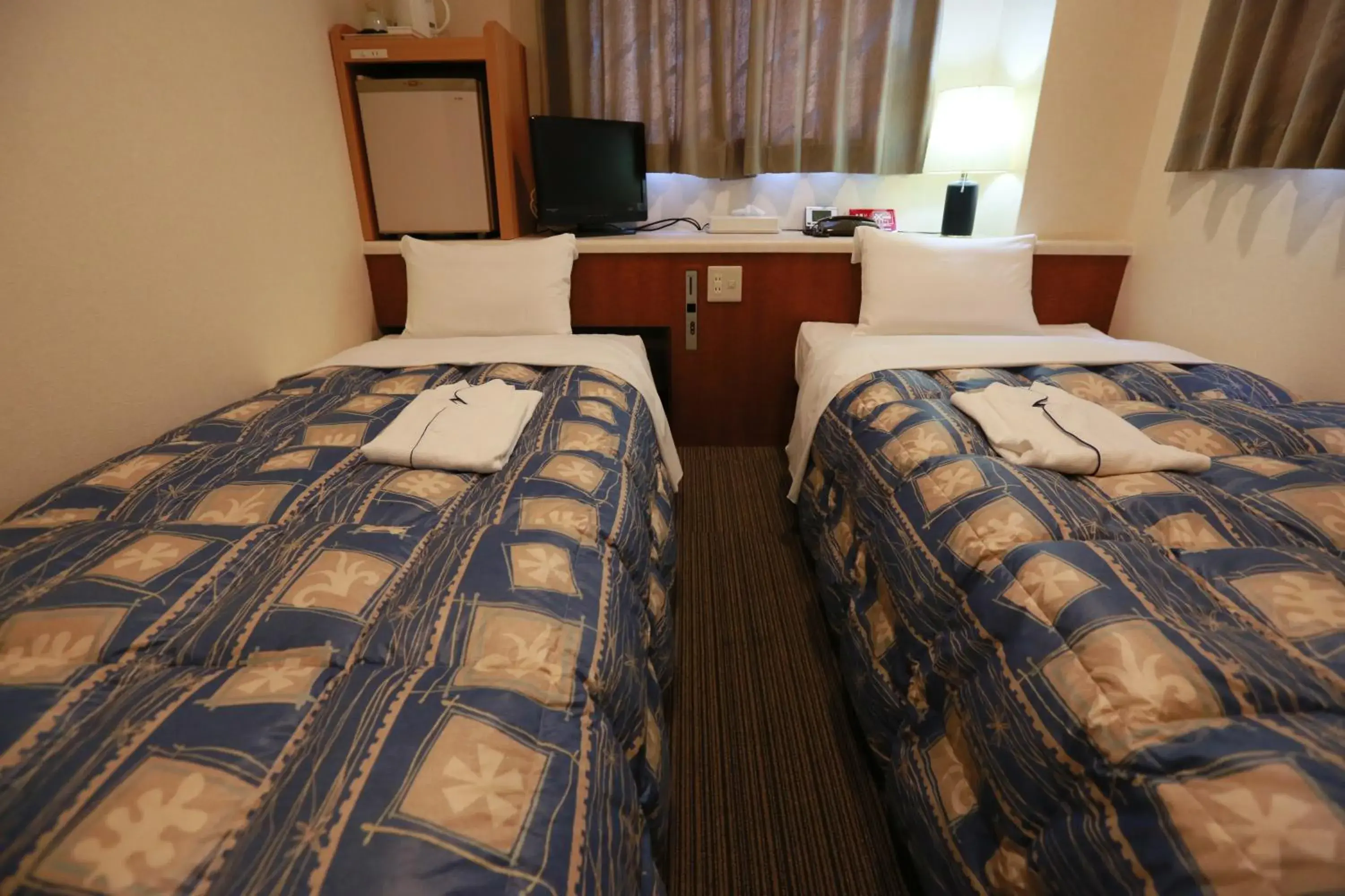 Bed in Hotel Ikeda Bed in Hotel Ikeda