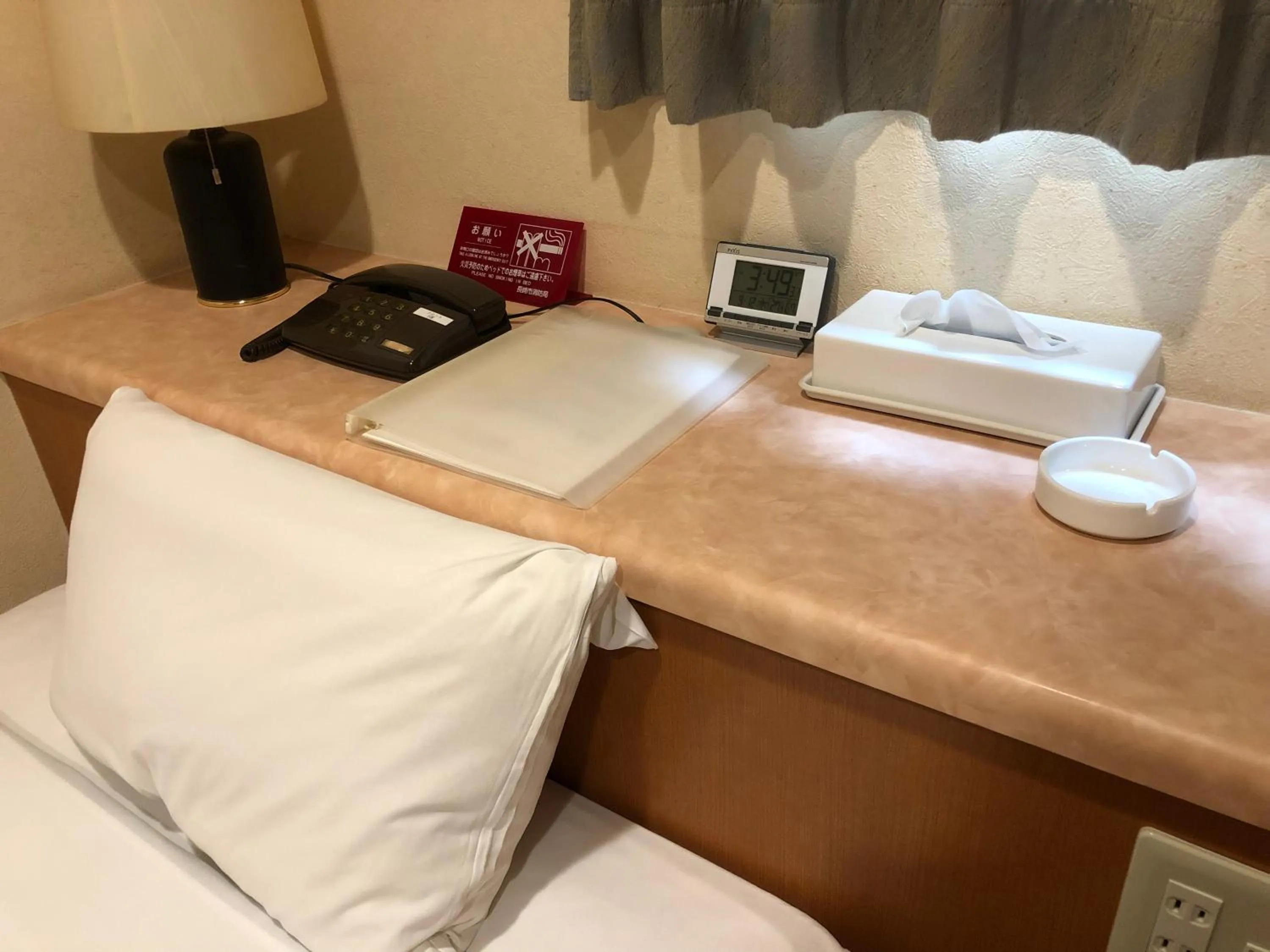 Bed in Hotel Ikeda