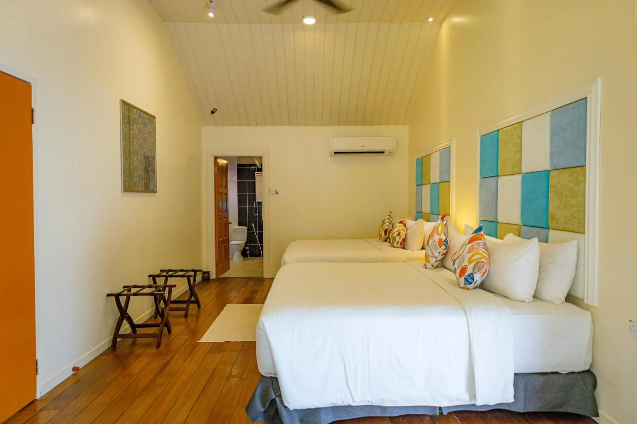 Bed in Sutera Sanctuary Lodges at Manukan Island