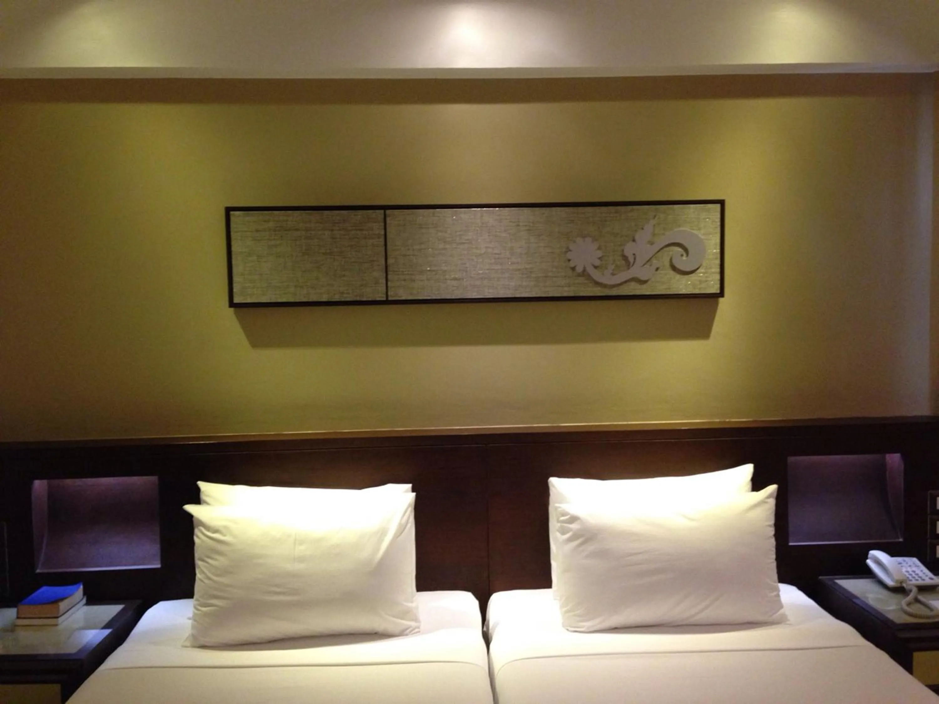 Bed in Wiang Inn Hotel