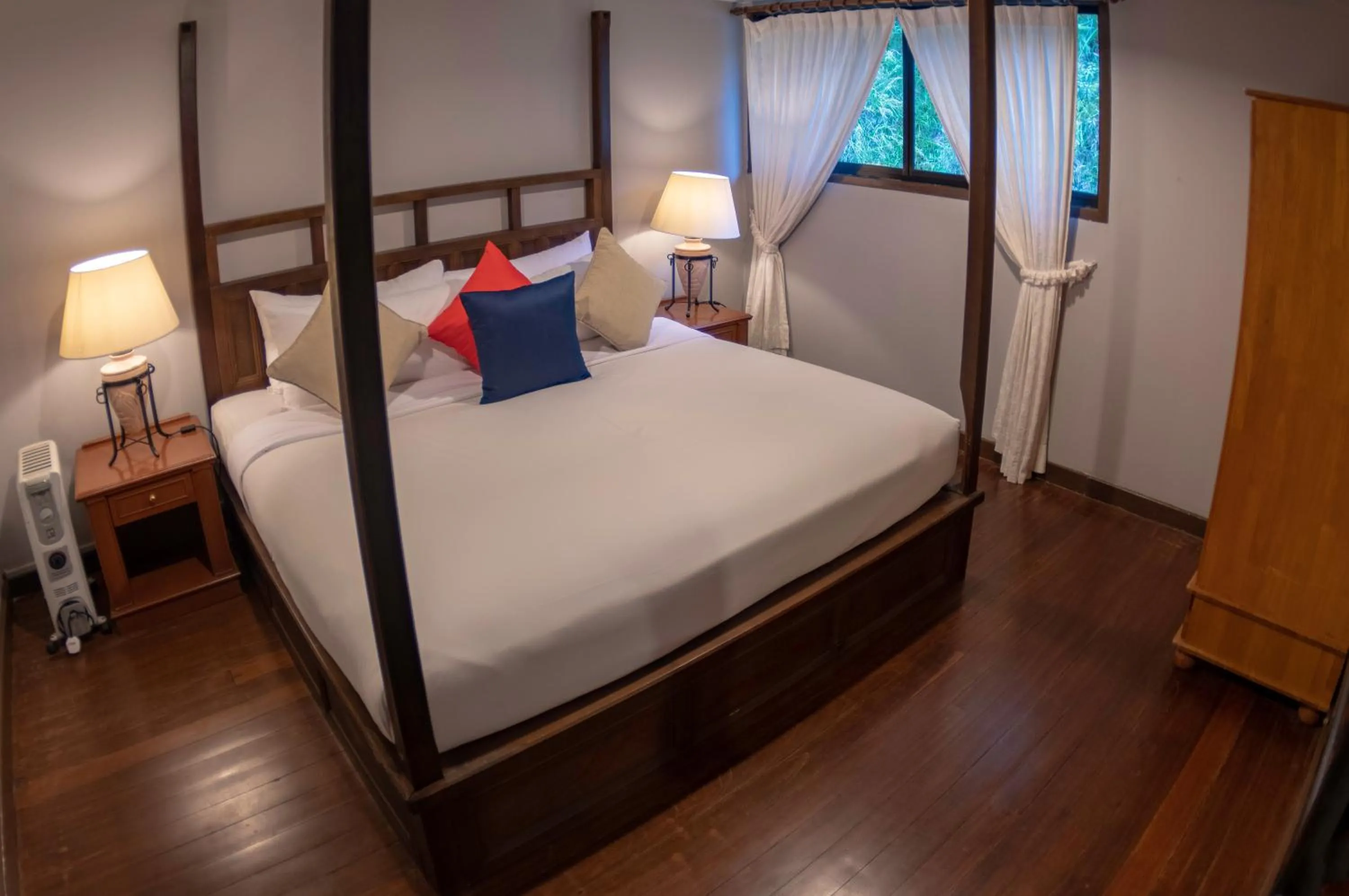 Bed in Sutera Sanctuary Lodges At Kinabalu Park