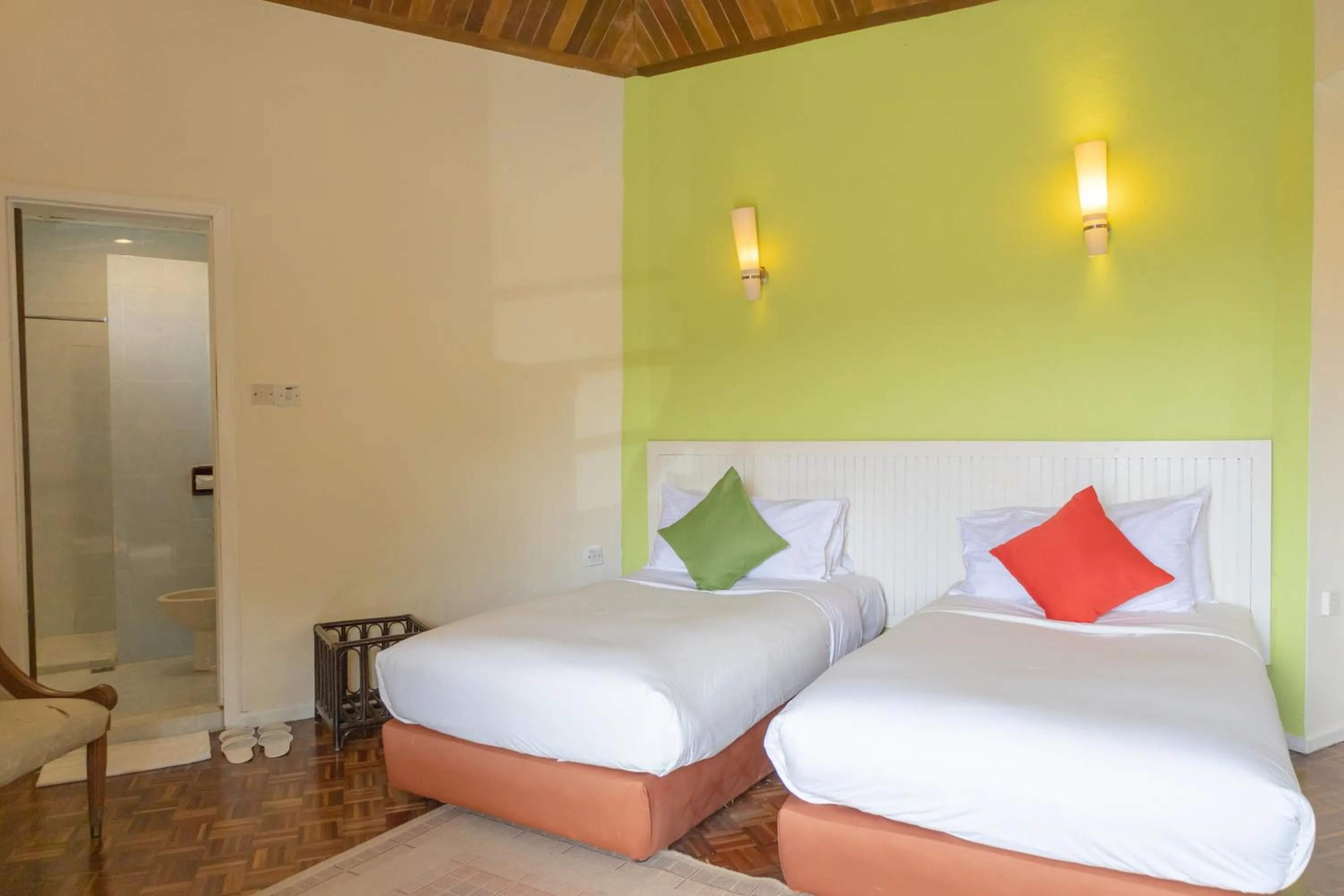 Bed in Sutera Sanctuary Lodges At Kinabalu Park