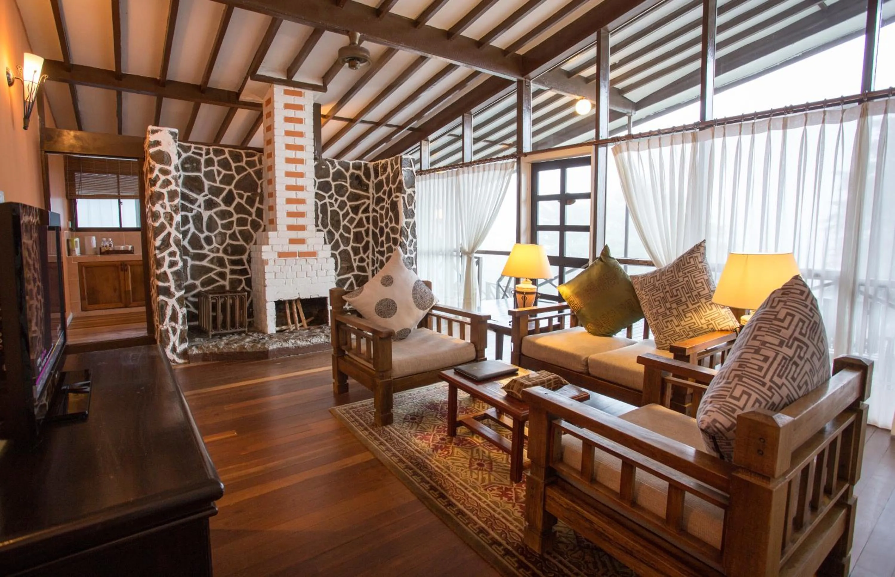 Living room in Sutera Sanctuary Lodges At Kinabalu Park