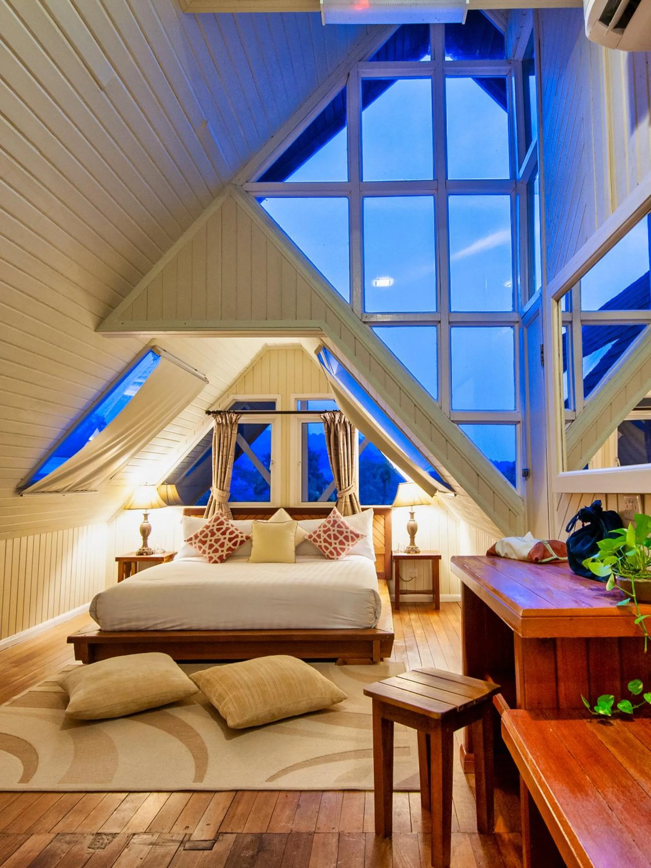 Bed in Sutera Sanctuary Lodges At Poring Hot Springs