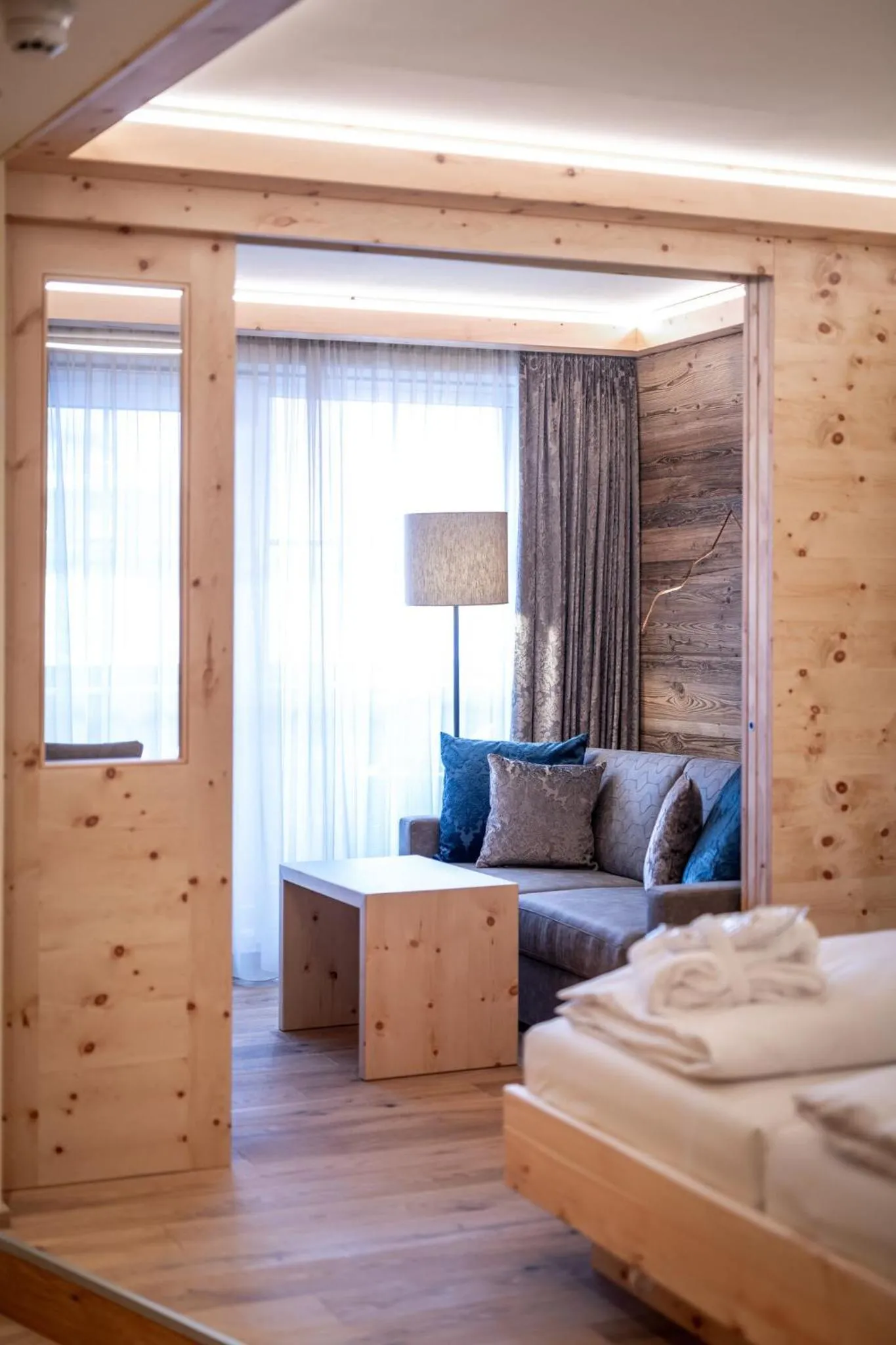 Living room, Bed in Hotel Kornock