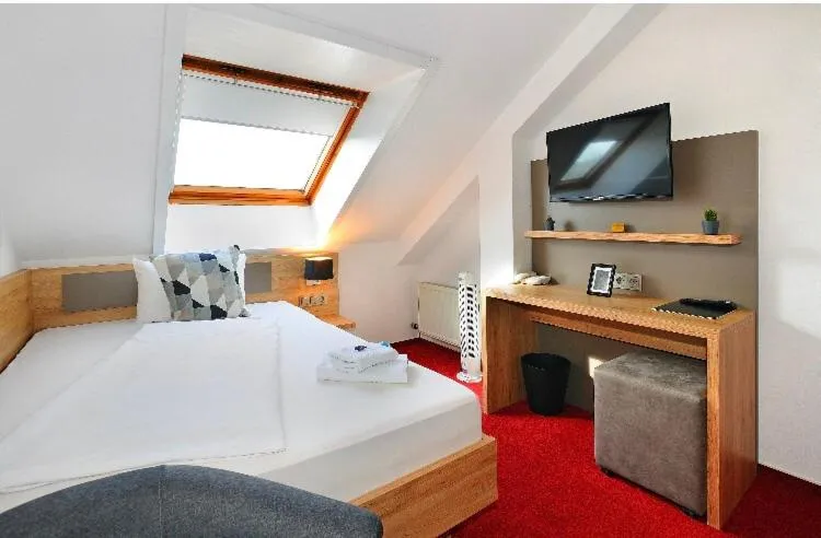 Bed in Vico's Hotel & Restaurant Asperg