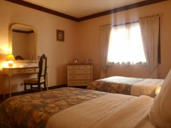 Bed in Las Flores Beachside Hotel