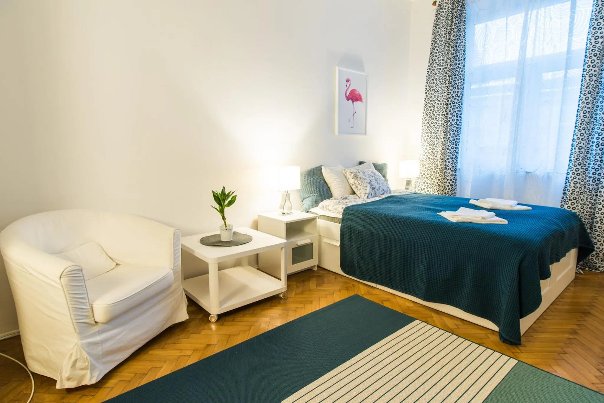 Bed in Trip Apartments