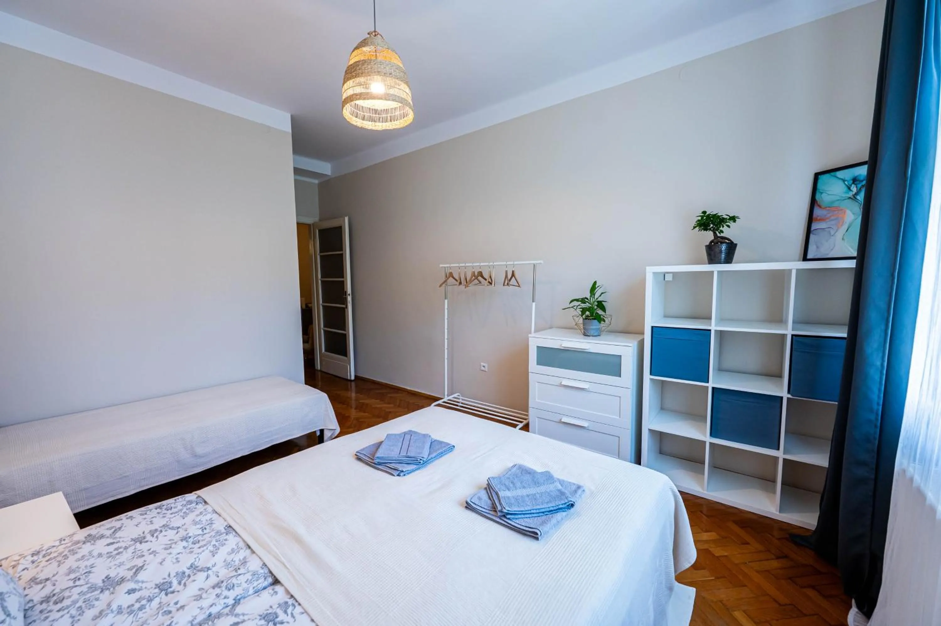 Bed in Trip Apartments