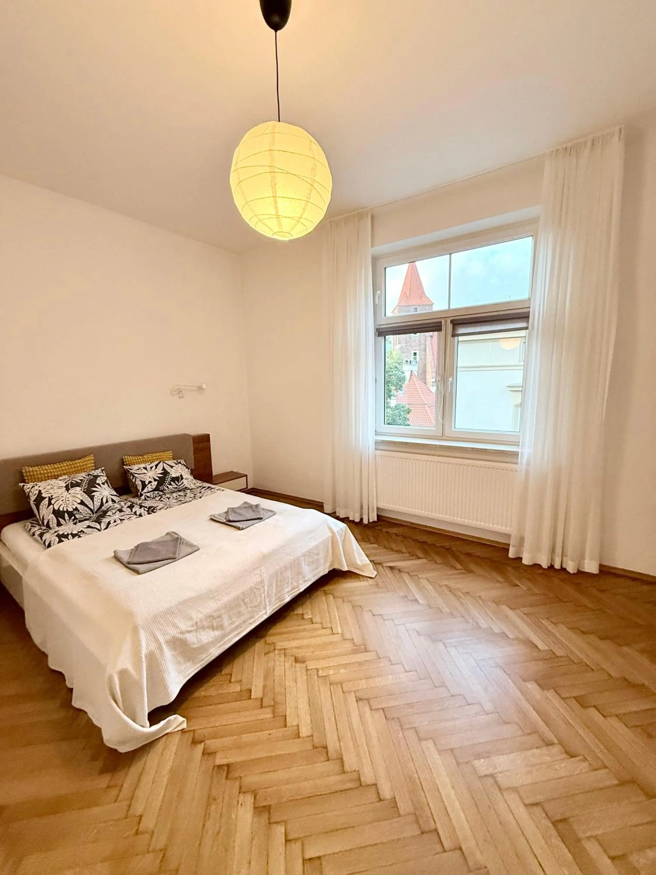 Bed in Trip Apartments