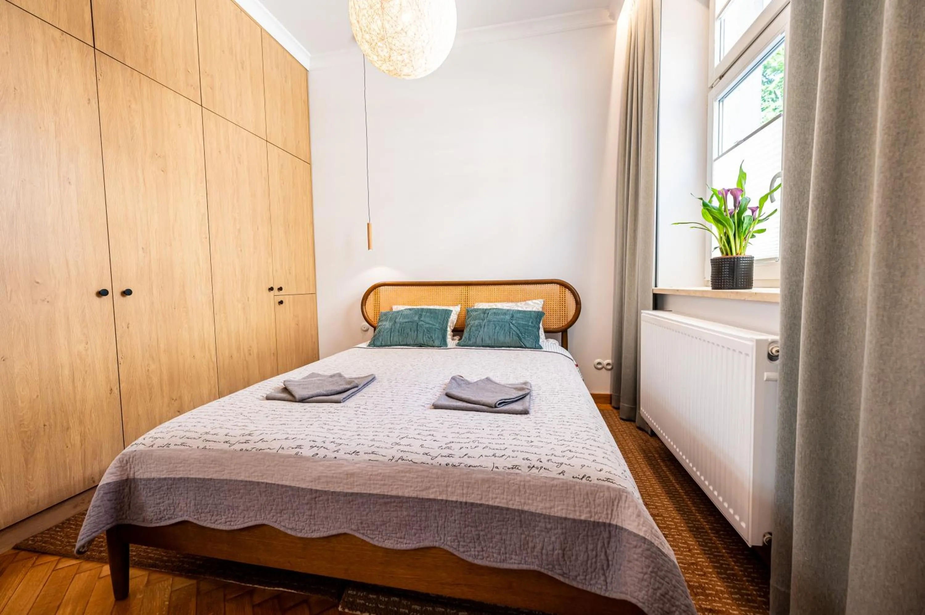 Bed in Trip Apartments