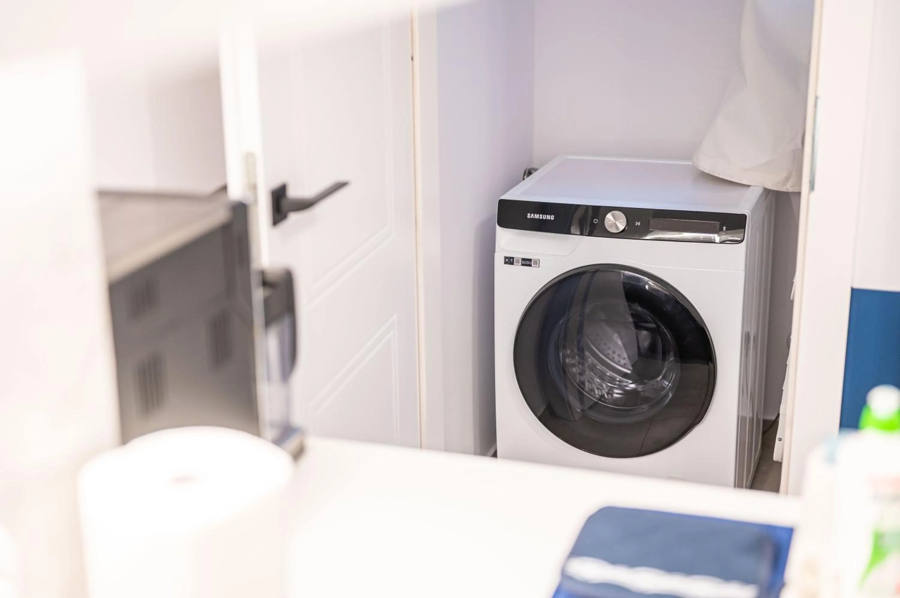 washing machine in Trip Apartments