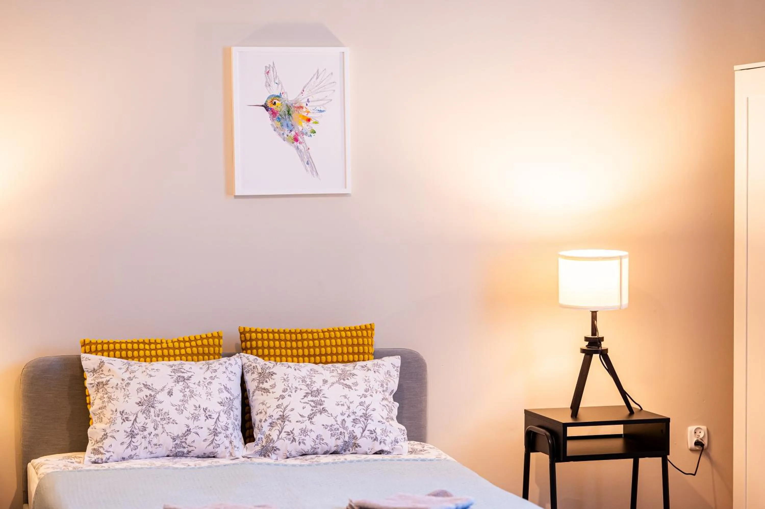 Bed in Trip Apartments