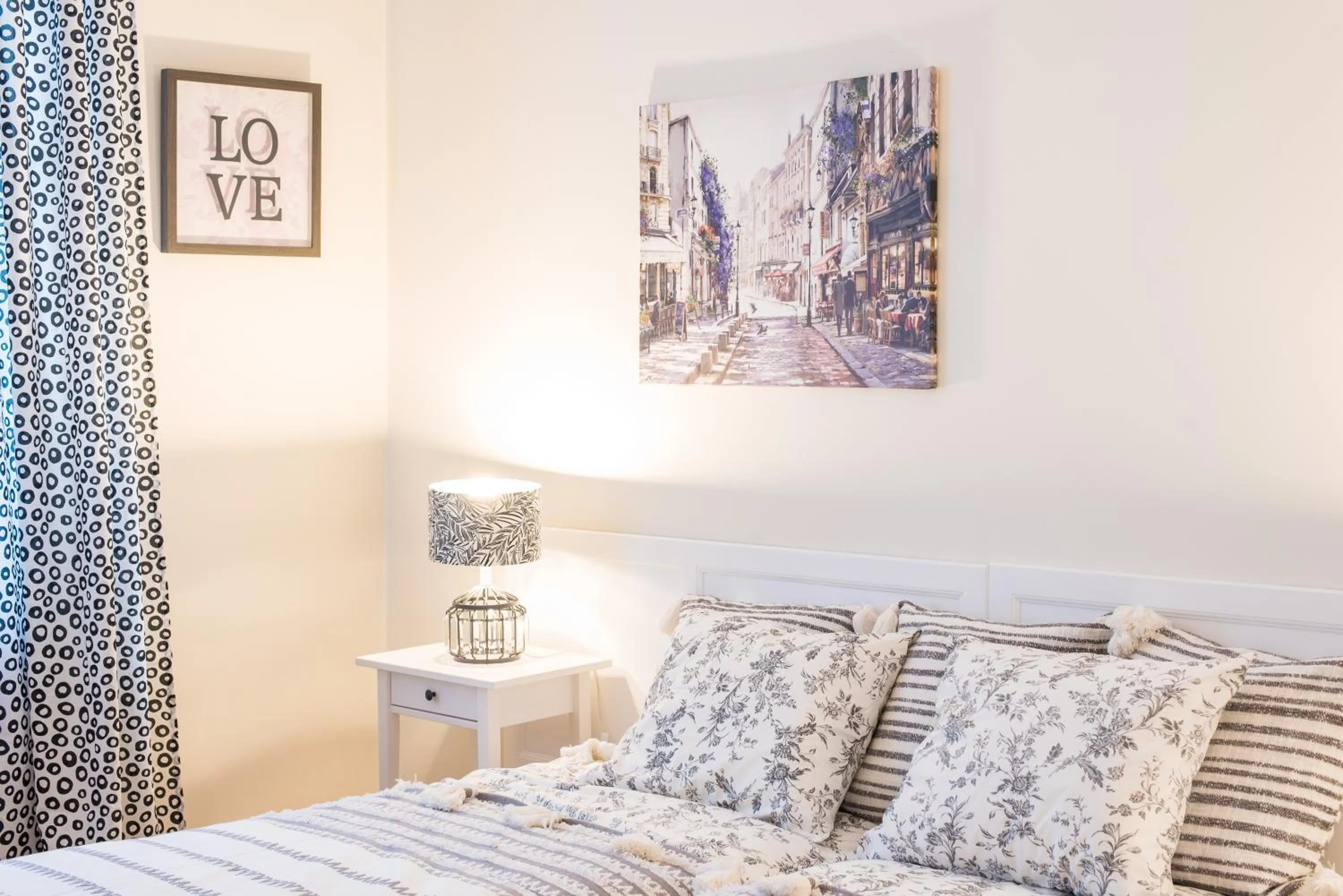Bed in Trip Apartments