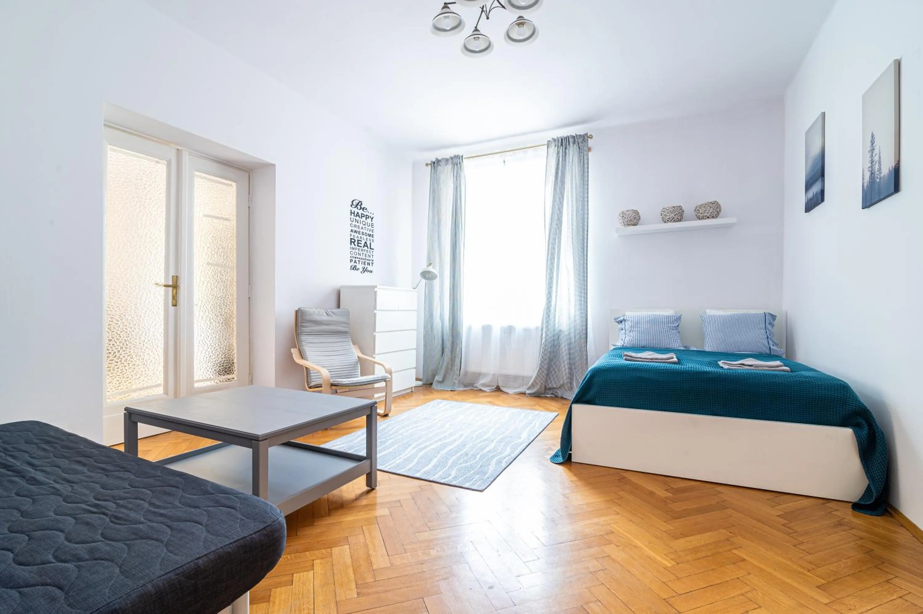Bed in Trip Apartments