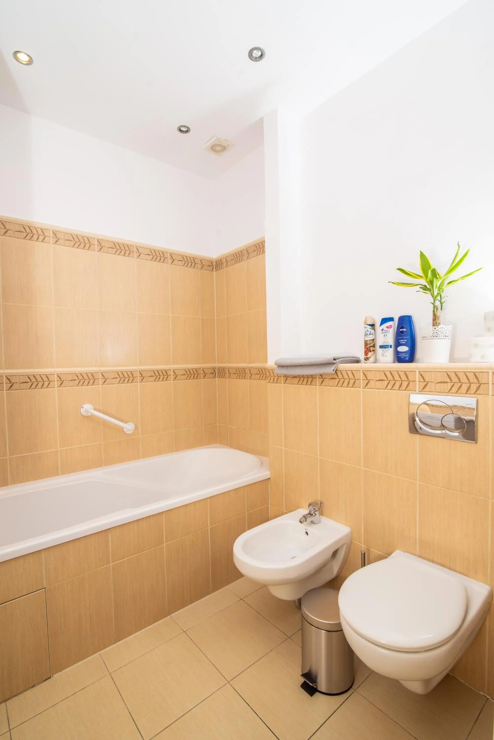 Toilet in Trip Apartments