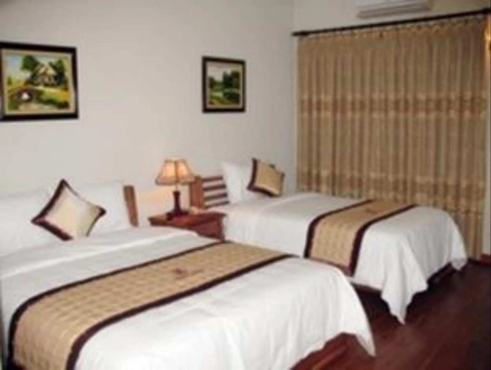 Bed in Lam Bao Long Hotel