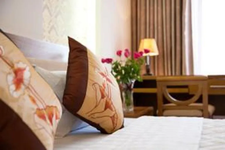 Bed in Lam Bao Long Hotel