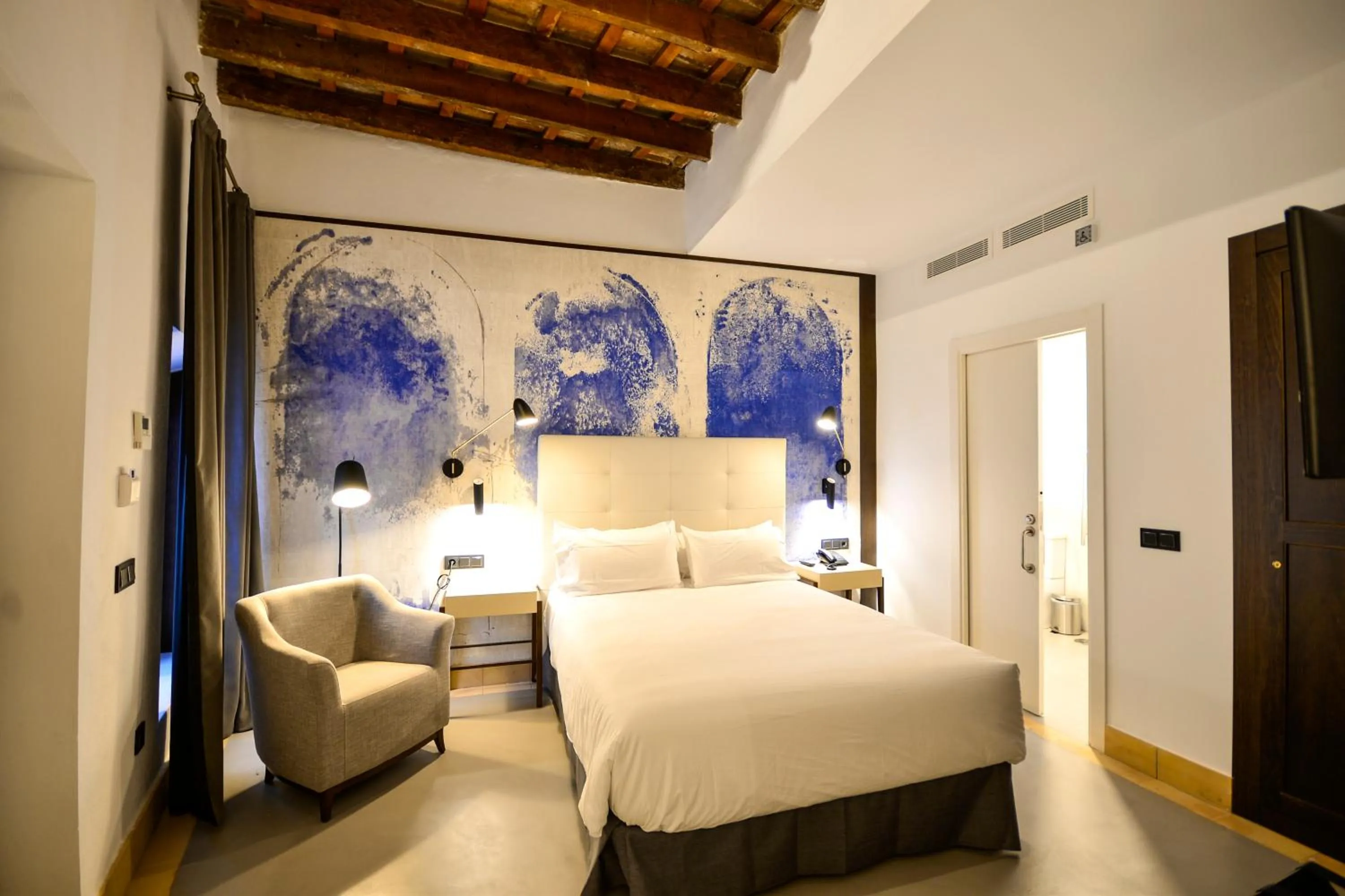 Bed in Legado Alcazar Hotel