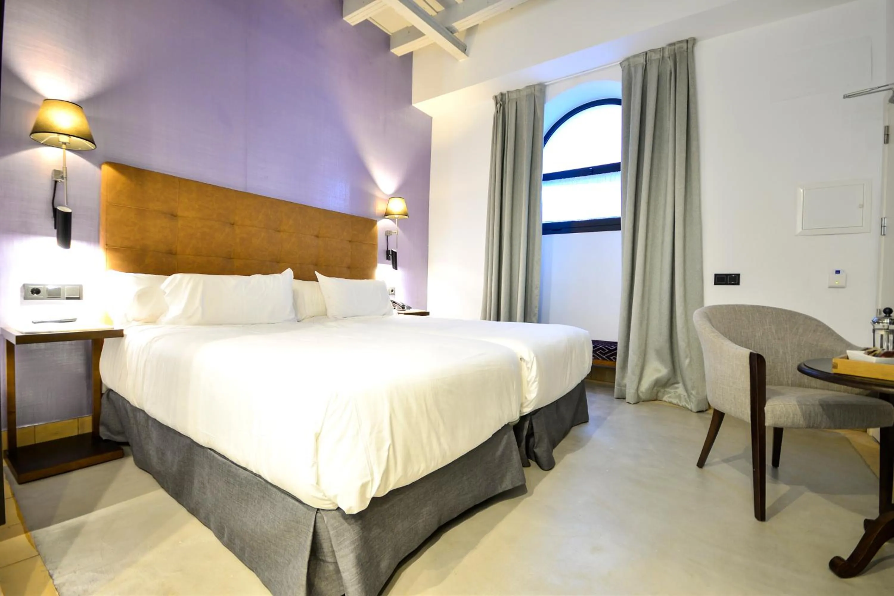 Bed in Legado Alcazar Hotel