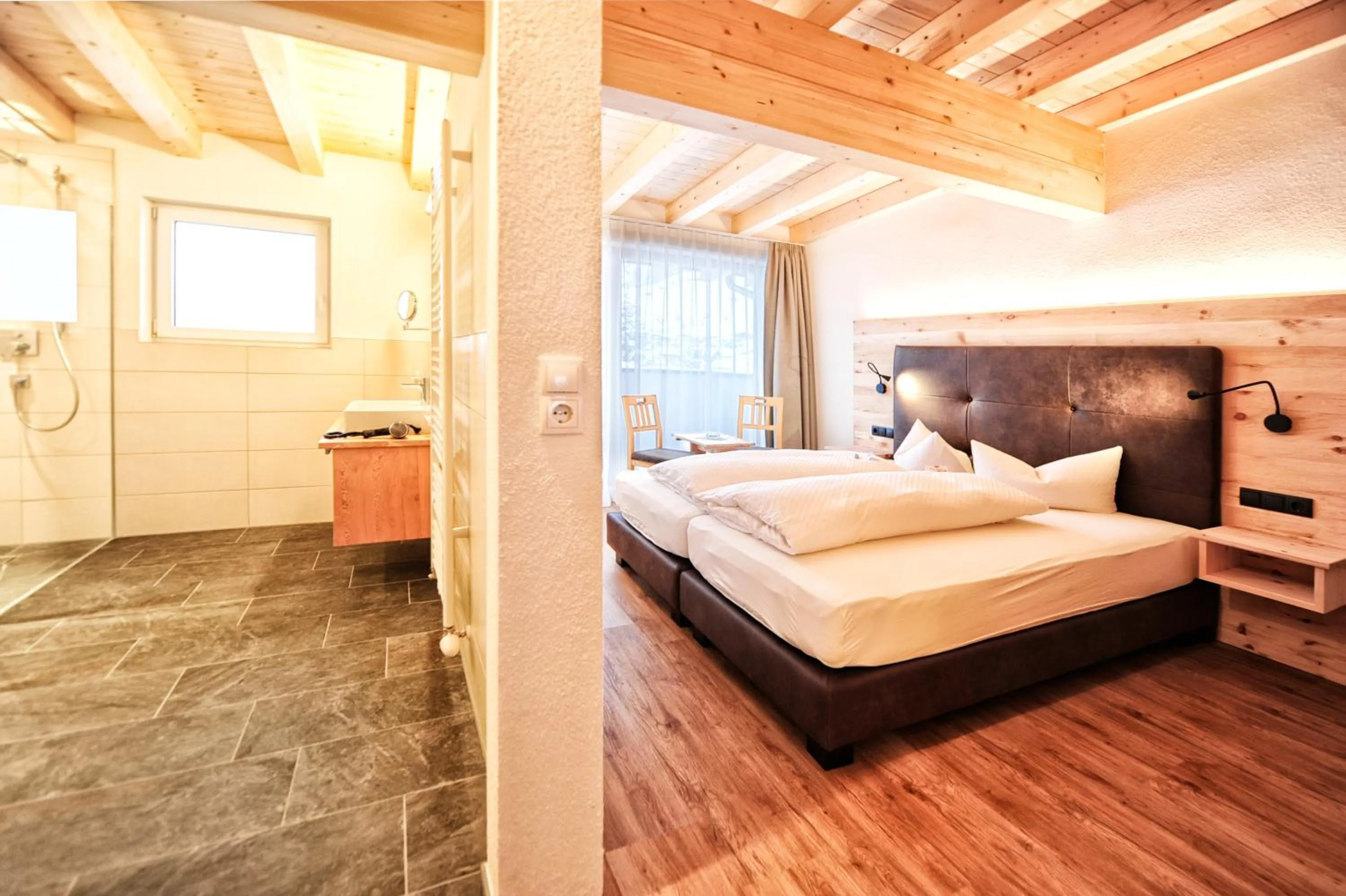 Photo of the whole room, Bed in Alpen Boutique Hotel Alpetta