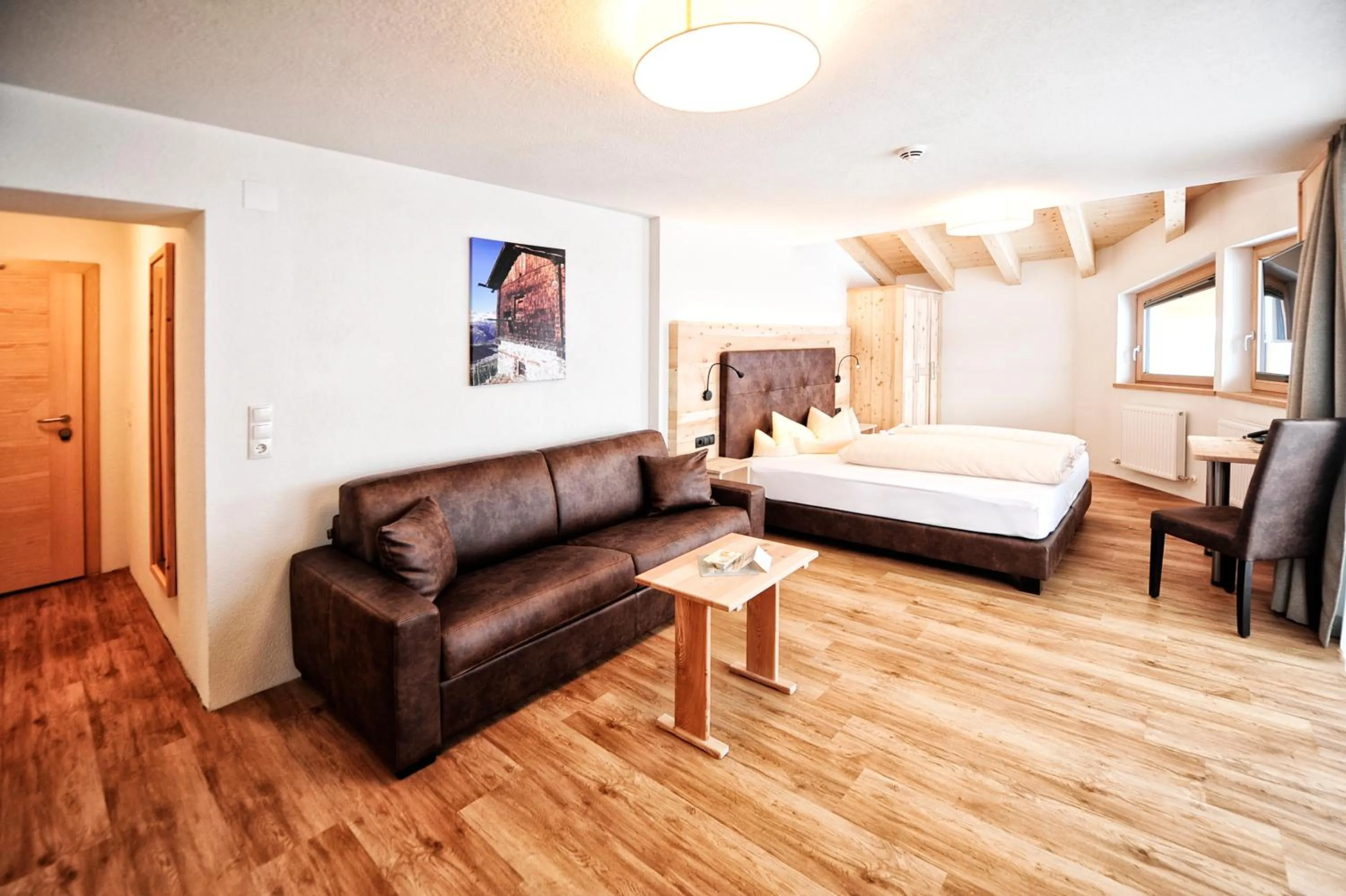 Photo of the whole room, Bed in Alpen Boutique Hotel Alpetta